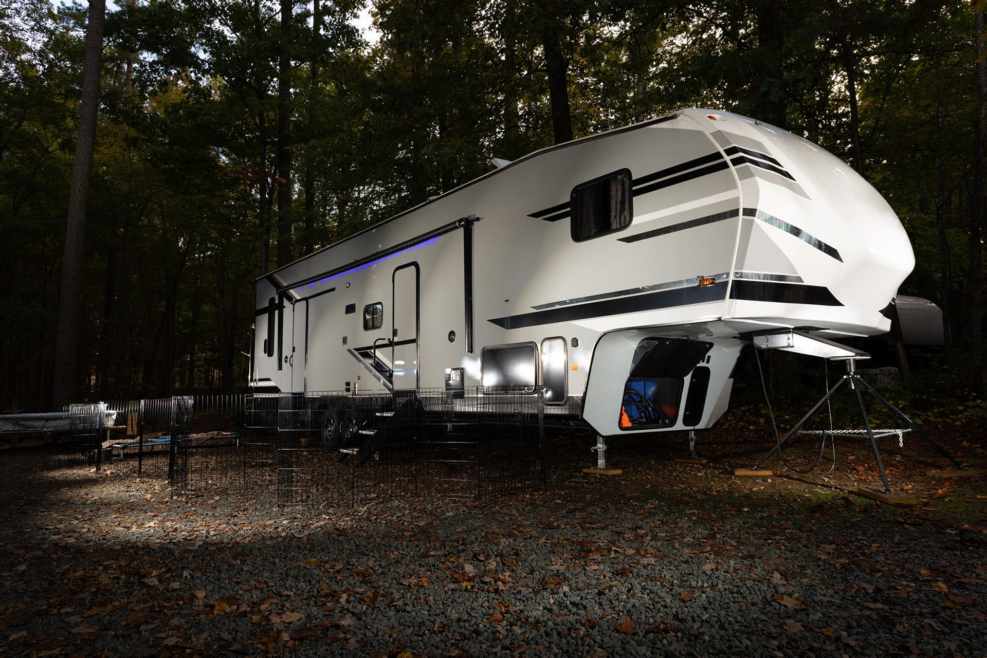 Fifth wheel camper with dog run at Falls Lake by Guy Sagi