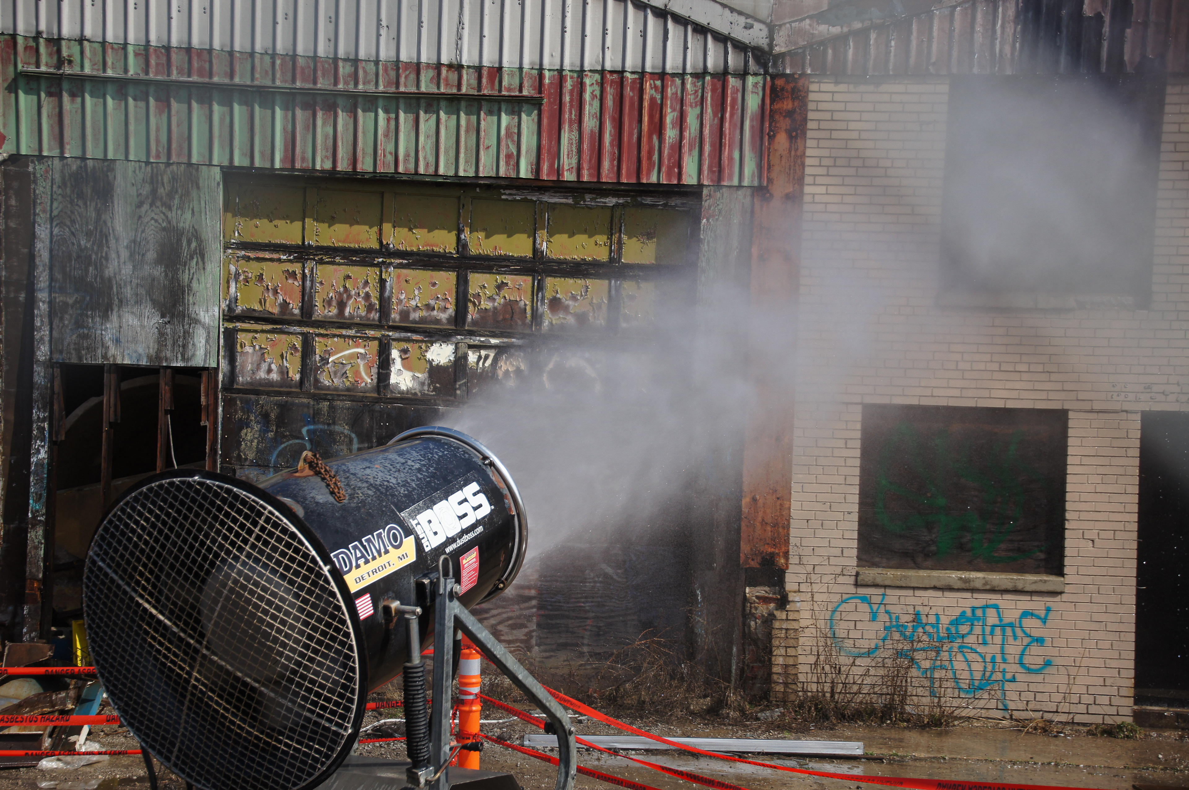 Demolition Day. Water is used to keep dust down