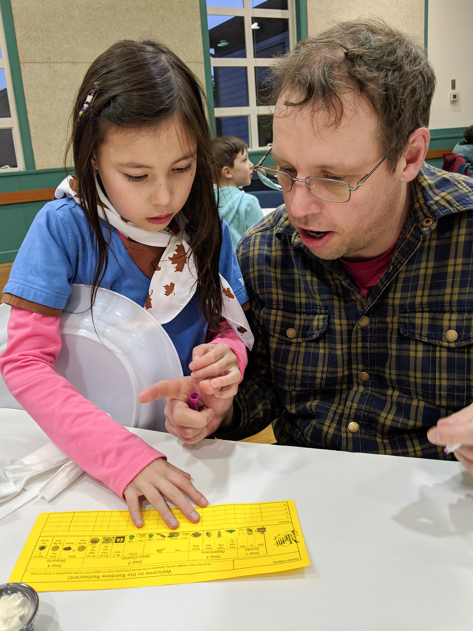 Brownies had a restaurant night where Josephine was a server, she had to take the orders and bring all the food.  She did a great job.