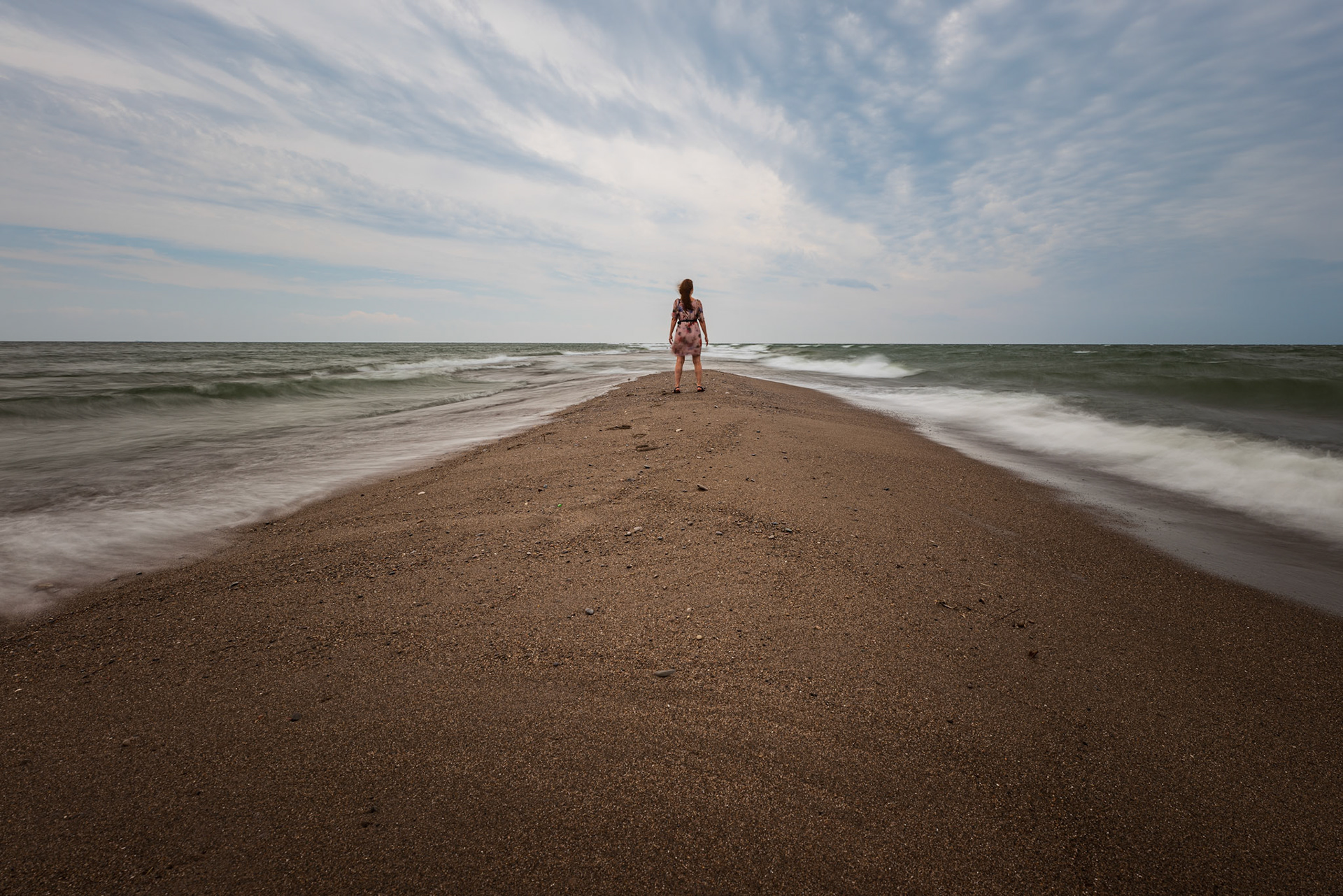 Point Pelee National Park is southernmost point of mainland Canada.  This is my wife looking south towards the United States.