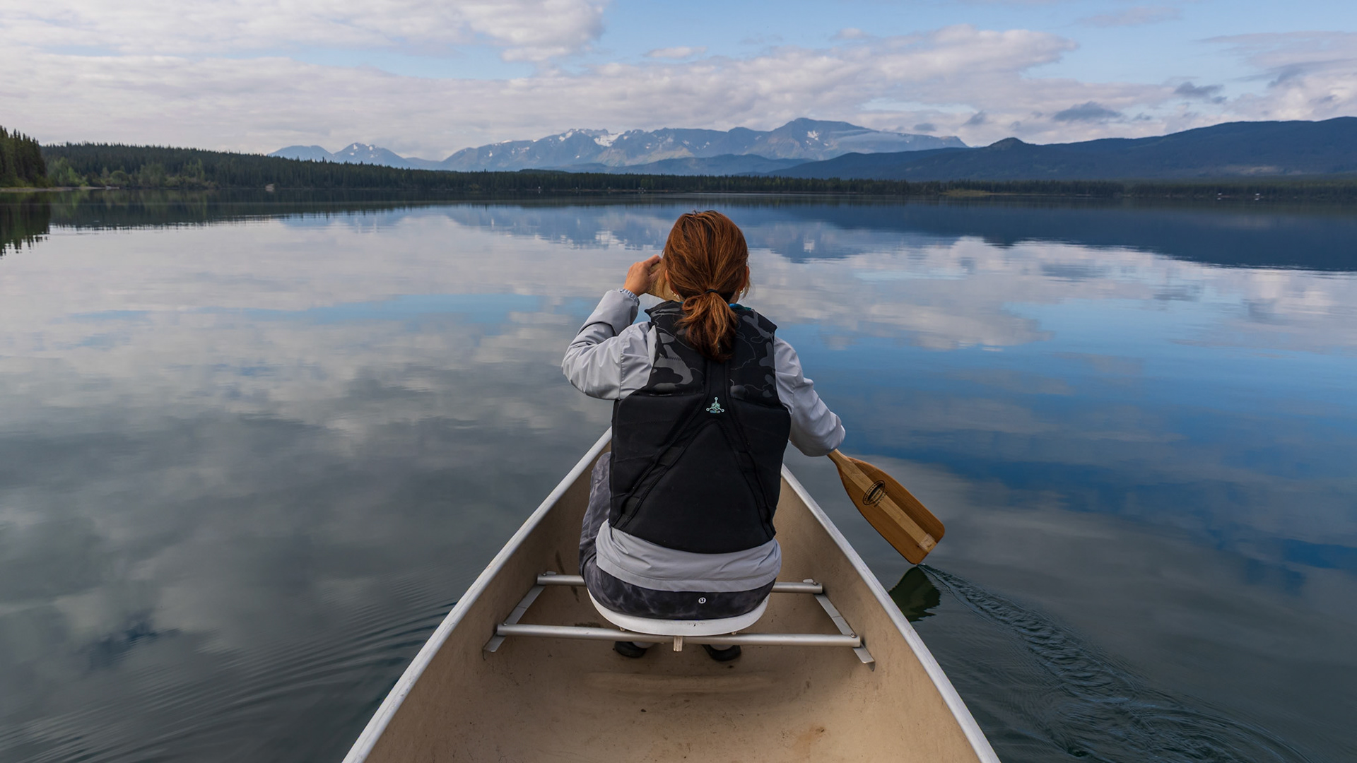 My wife paddling the front of the canoe on Kinaskan Lake.
