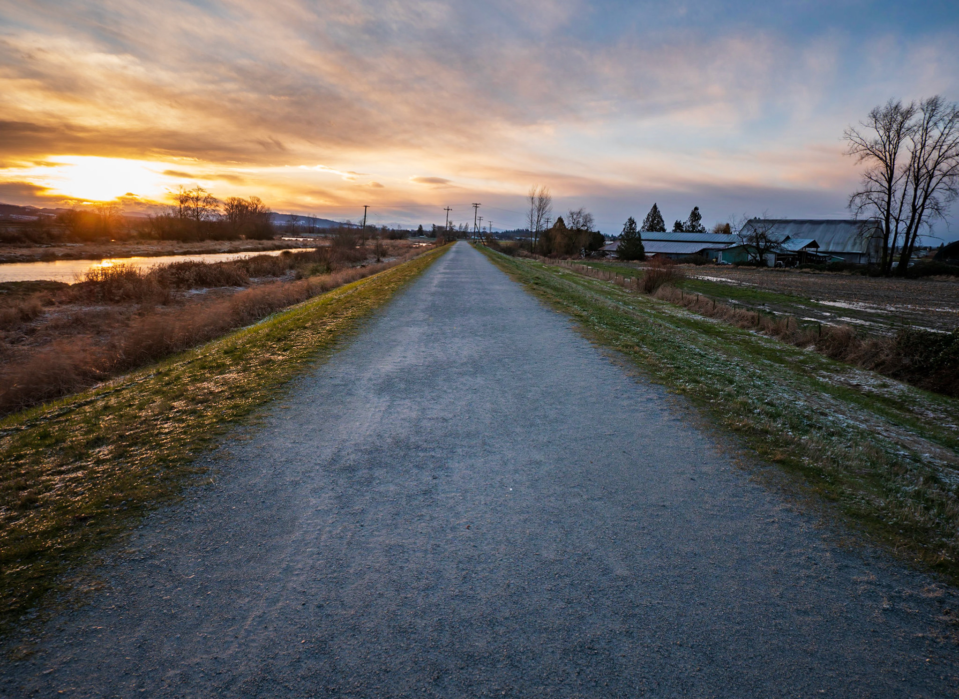 Quite walking trail at sunrise in Pitt Meadows.