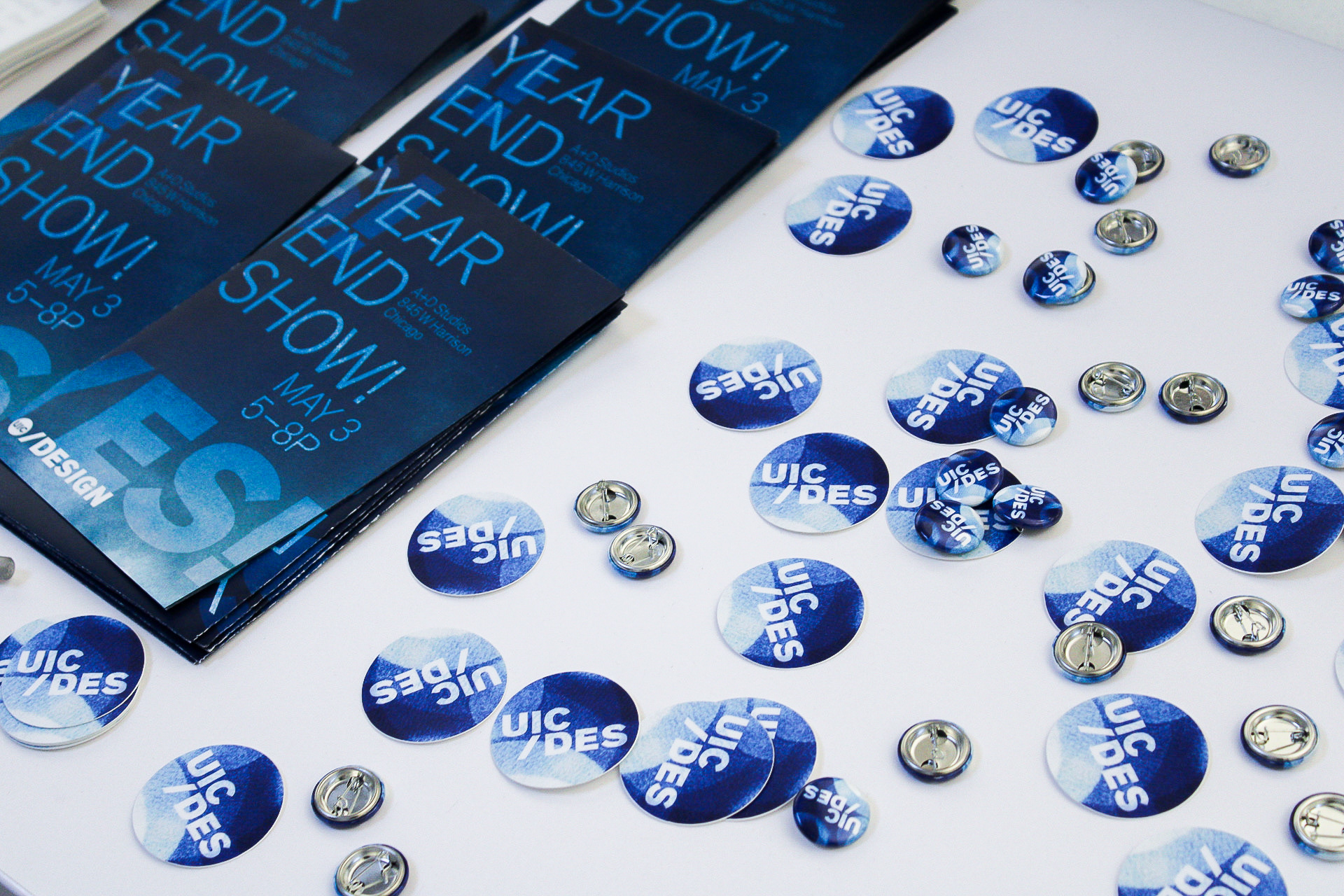 Programs, buttons, and stickers for guests