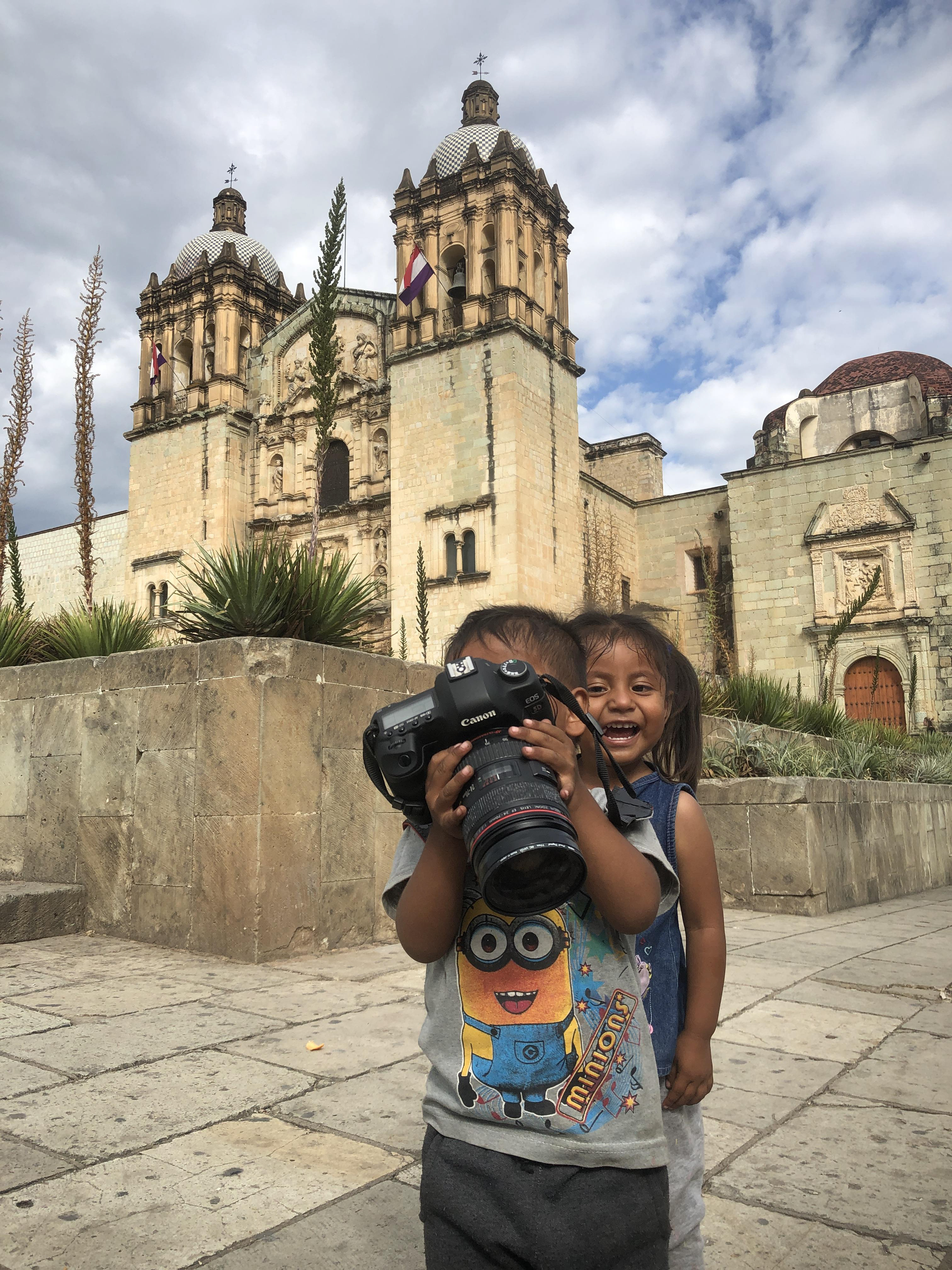 Kico and Lili having fun with Juan Escobedo's camera.