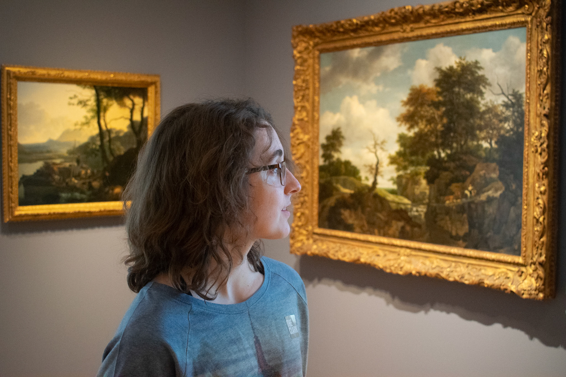 Sophie Throop, an art student at Williams College views art exhibits at The Clark Institute on February 22nd. I asked her to look to the side as her face shows great emotion even sideways as she is viewing the art. I expecially like the light as it fades away on her face.