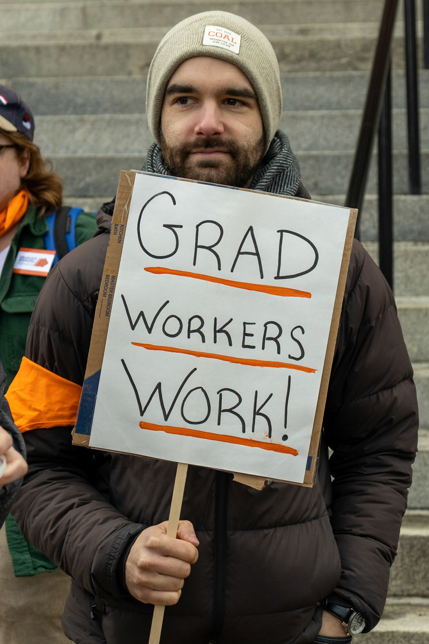 The Syracuse Graduate Employees Union gathered fellow students, supporting faculty and staff, as well as regular observers at the steps of Carnegie Library as they advocated for the University to recognize the union and accept the union's demands. The group then marched to the student center and onwards to the administration building where leaders would meet with the Provost.