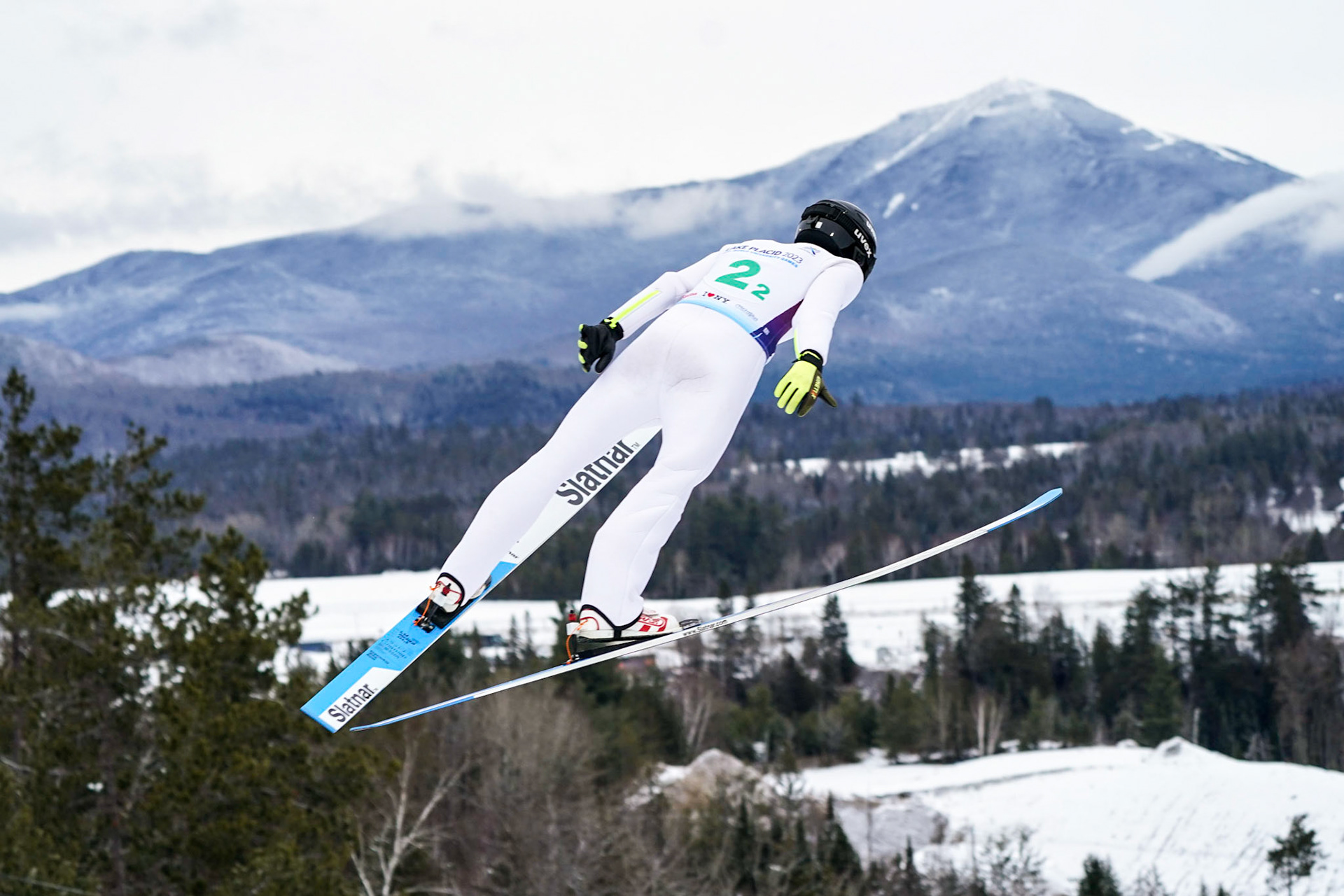 Both Men and Women flew through the air during the jumping portion of the Mixed Team event for Nordic Combined at the 2023 FISU World University Games on January 19, 2023 in Lake Placid, New York. (Photo by Bond Demetri Photos/FISU Games)