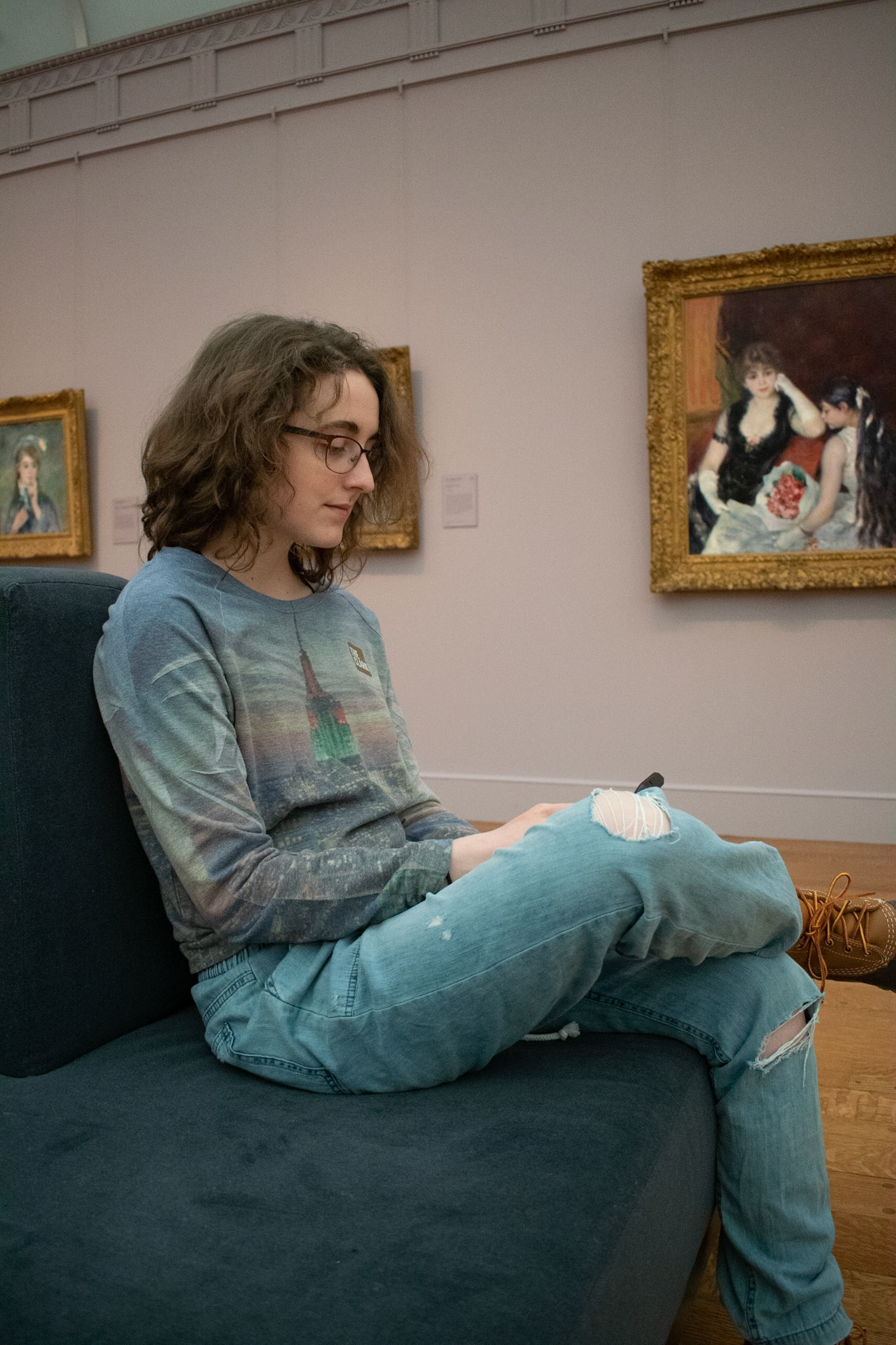 Sophie Throop, an art student at Williams College takes a break of viewing art exhibits at The Clark Institute on February 22nd.