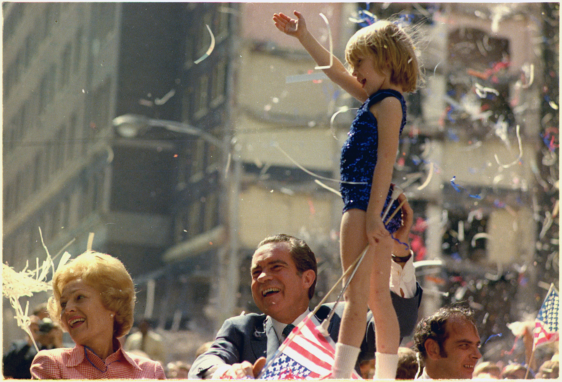 President Nixon and Pat Nixon wave to a crowd in Atlanta, Georgia during a campaign motorcade, 12 October 1972 (US National Archives, 37-WHPO-D0692-12)