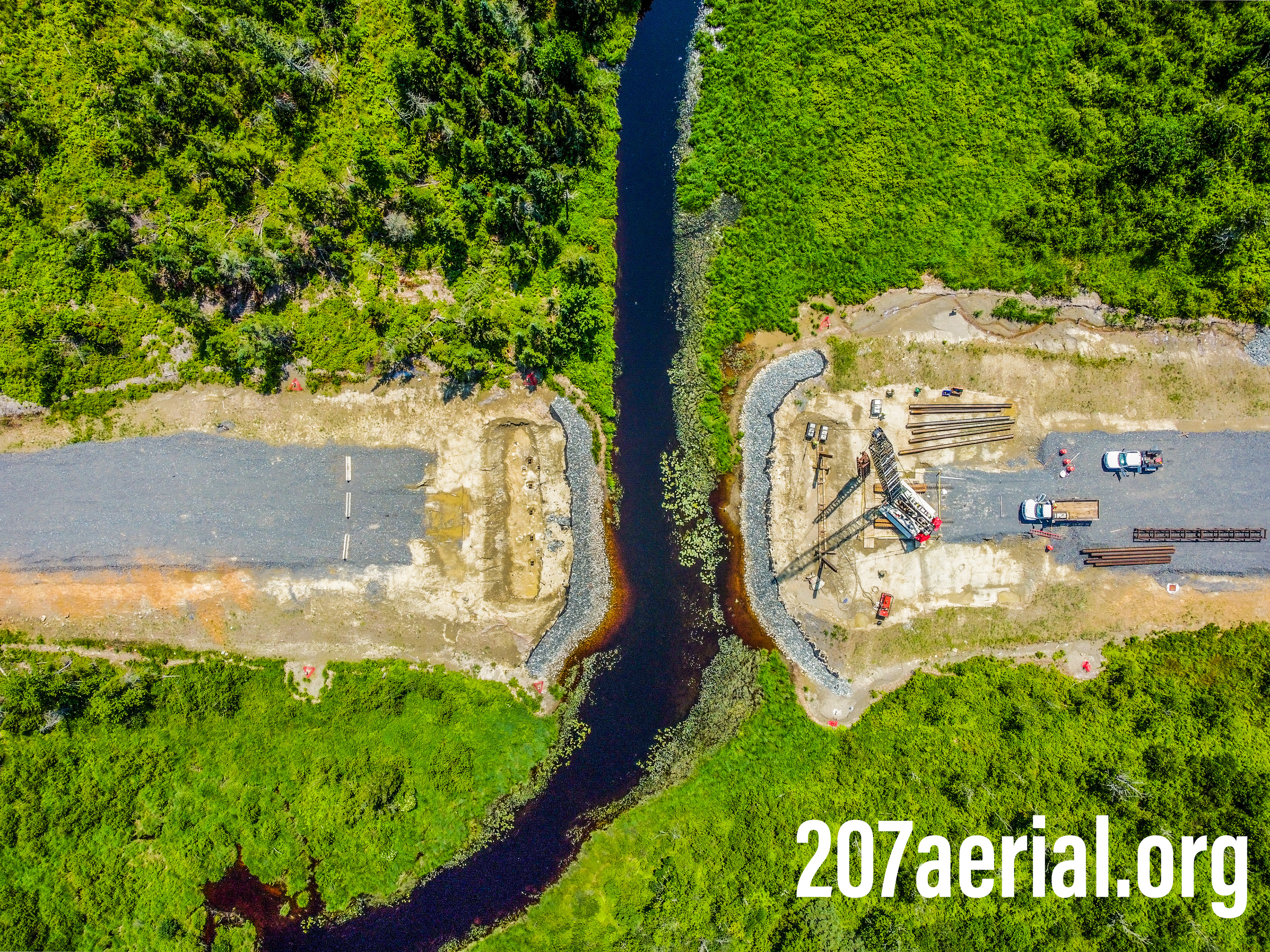 Aerial view of Eaton Brook bridge crossing and construction in Brewer, Maine. July 2023.