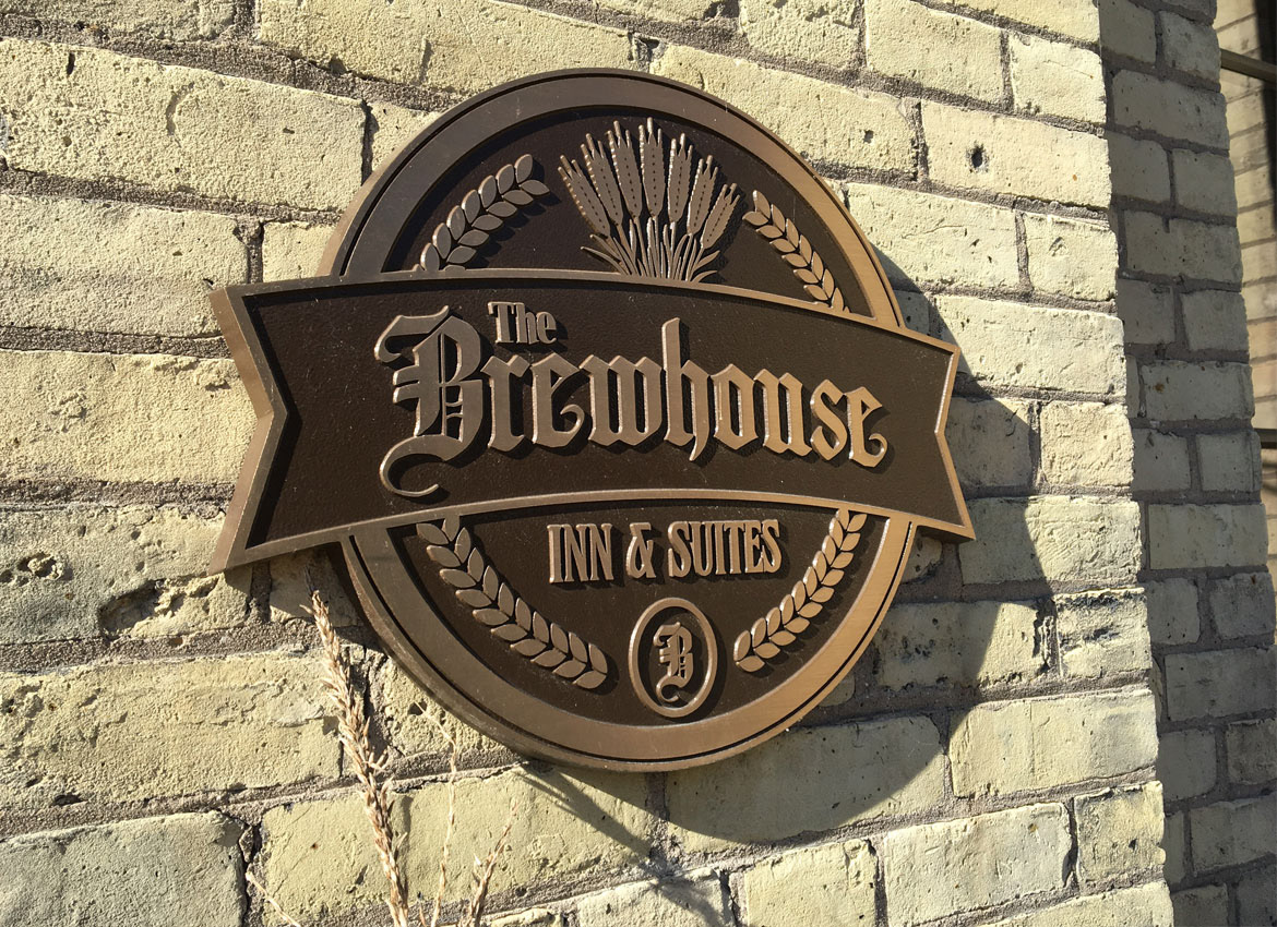 Cast Logo on outside of building