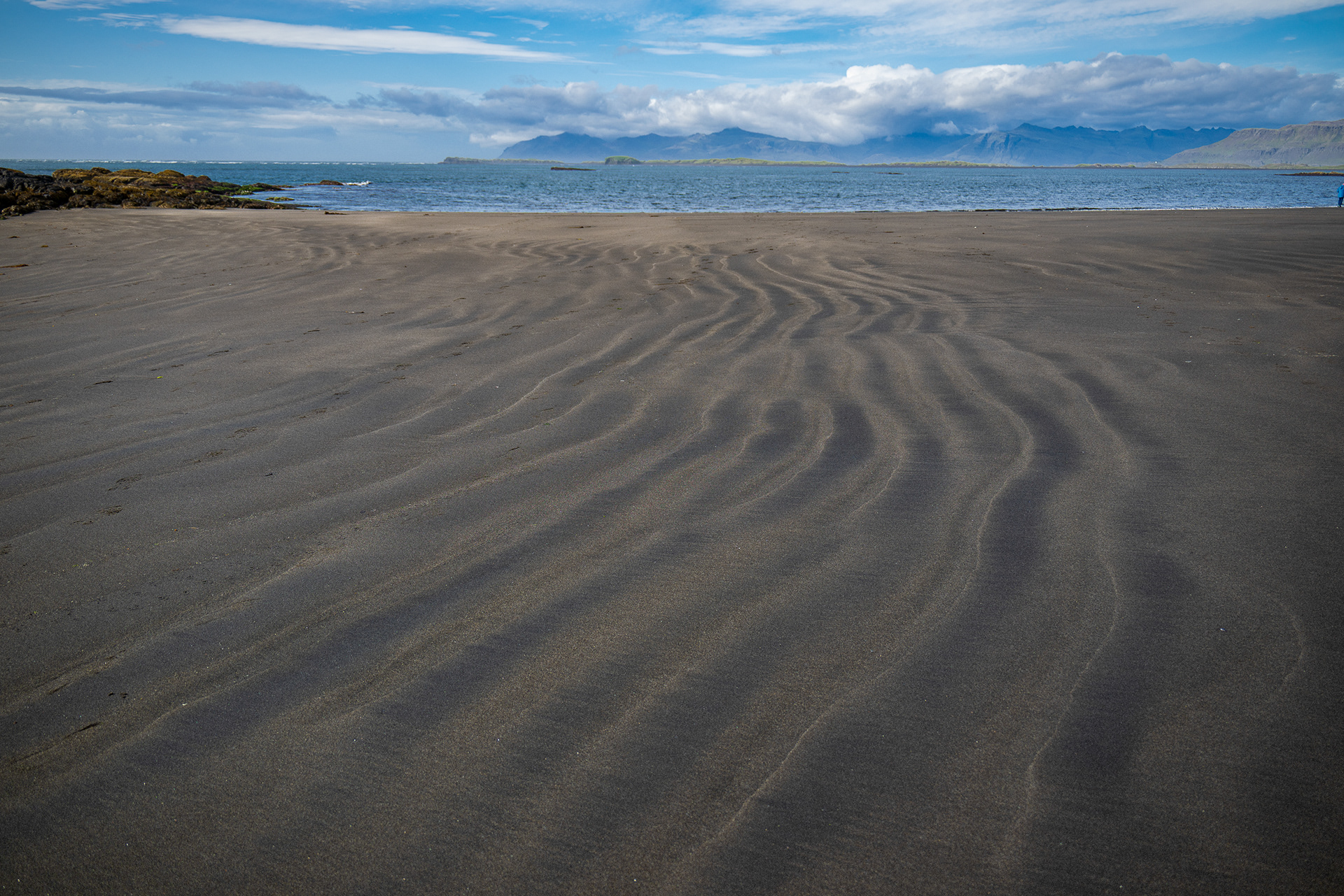 Scene at Djupivogur black sand beach