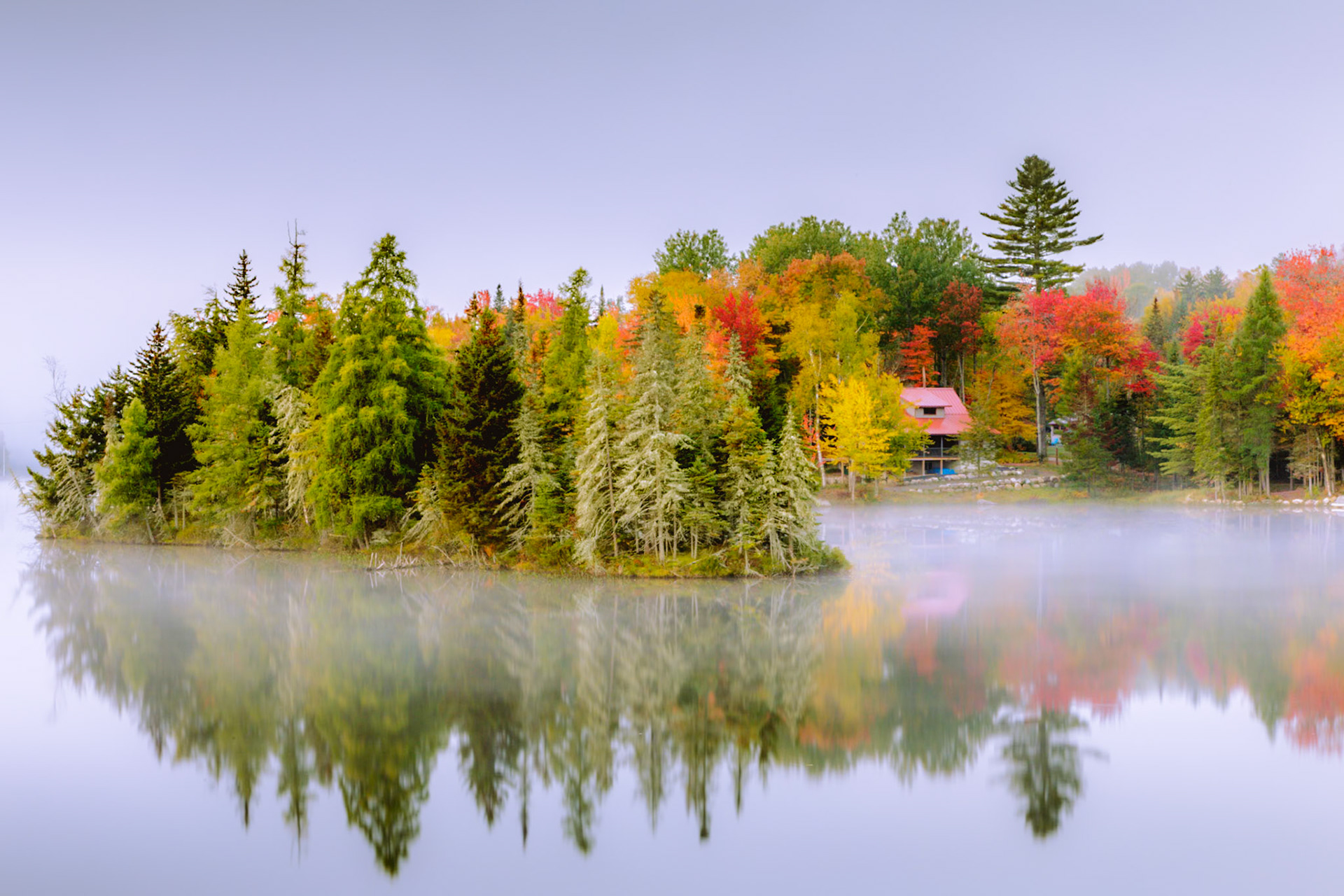 Fog Covered Lake and Island with fall colors
