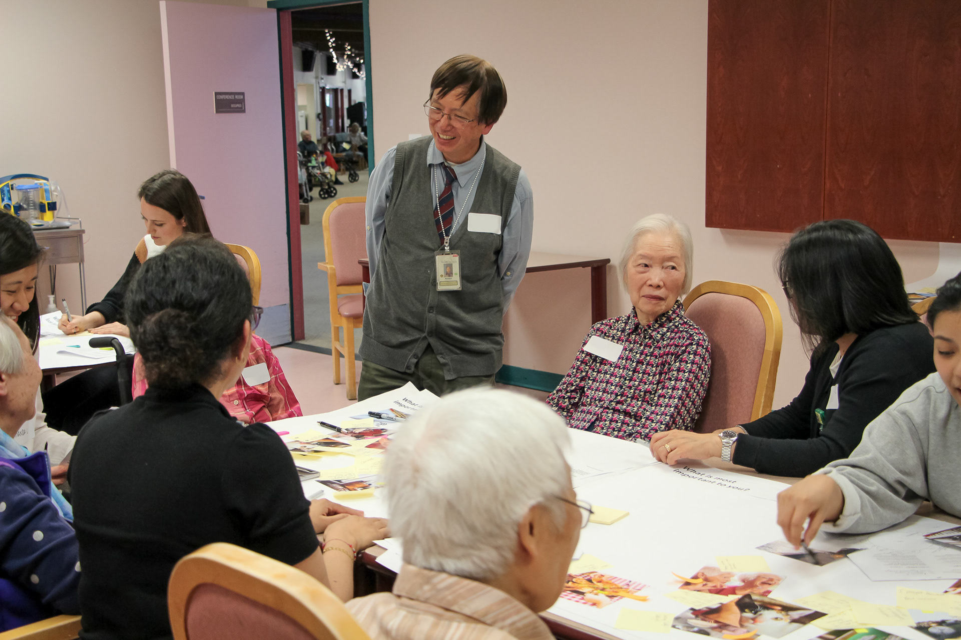 The interpreter helps the team translate residents' during Activity One.