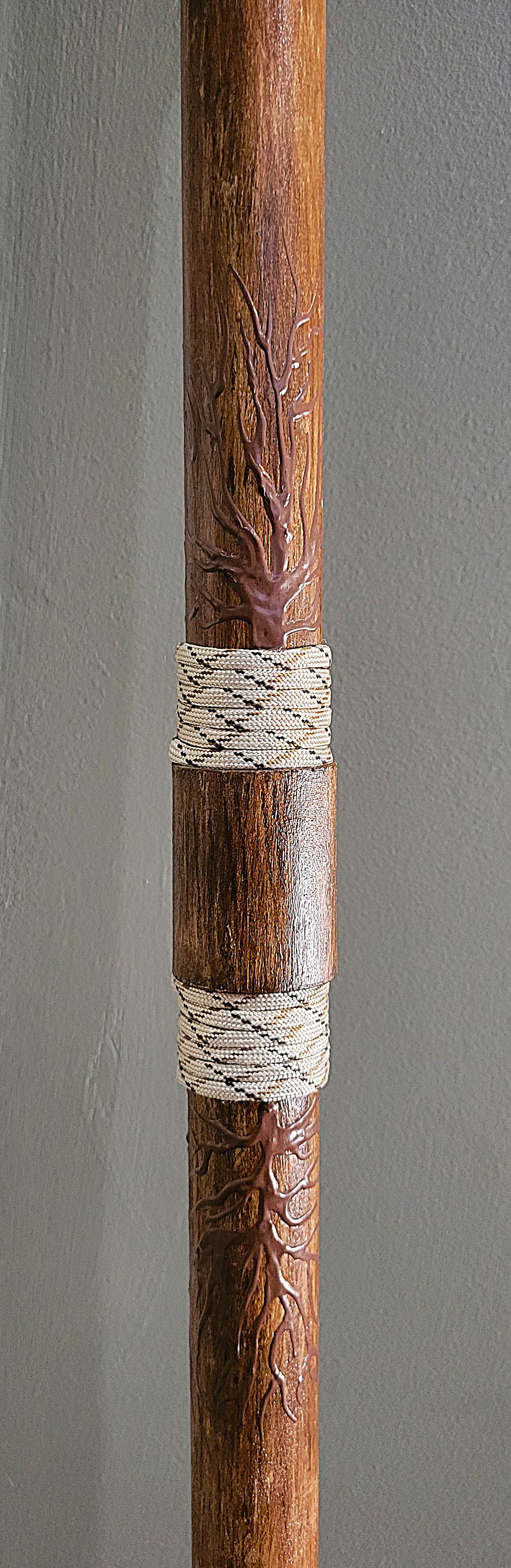 Functional object using a different material; Walking Stick (PVC Pipe, acrylic paint, and paracord)