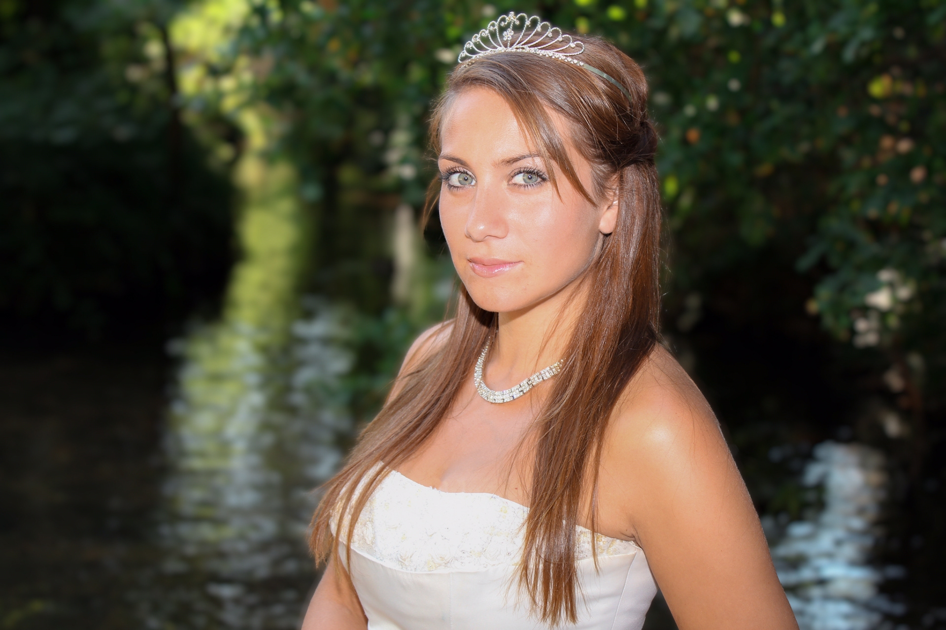 Bride in front of a lake