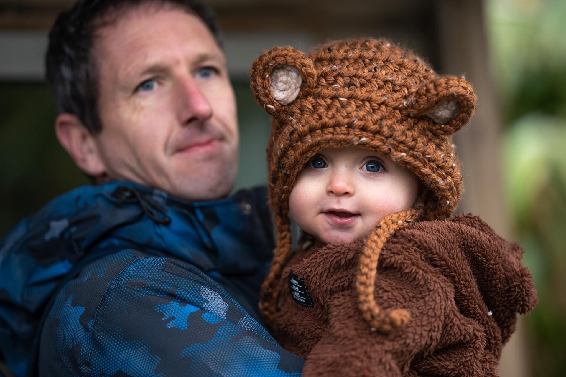Man carrying a baby