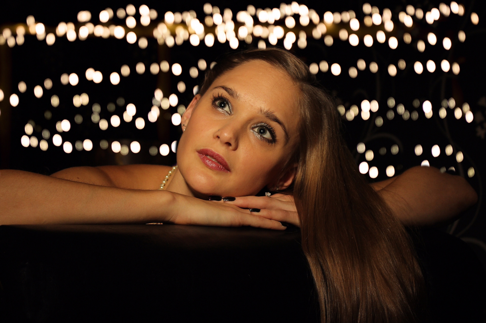 Lady with lights in the background