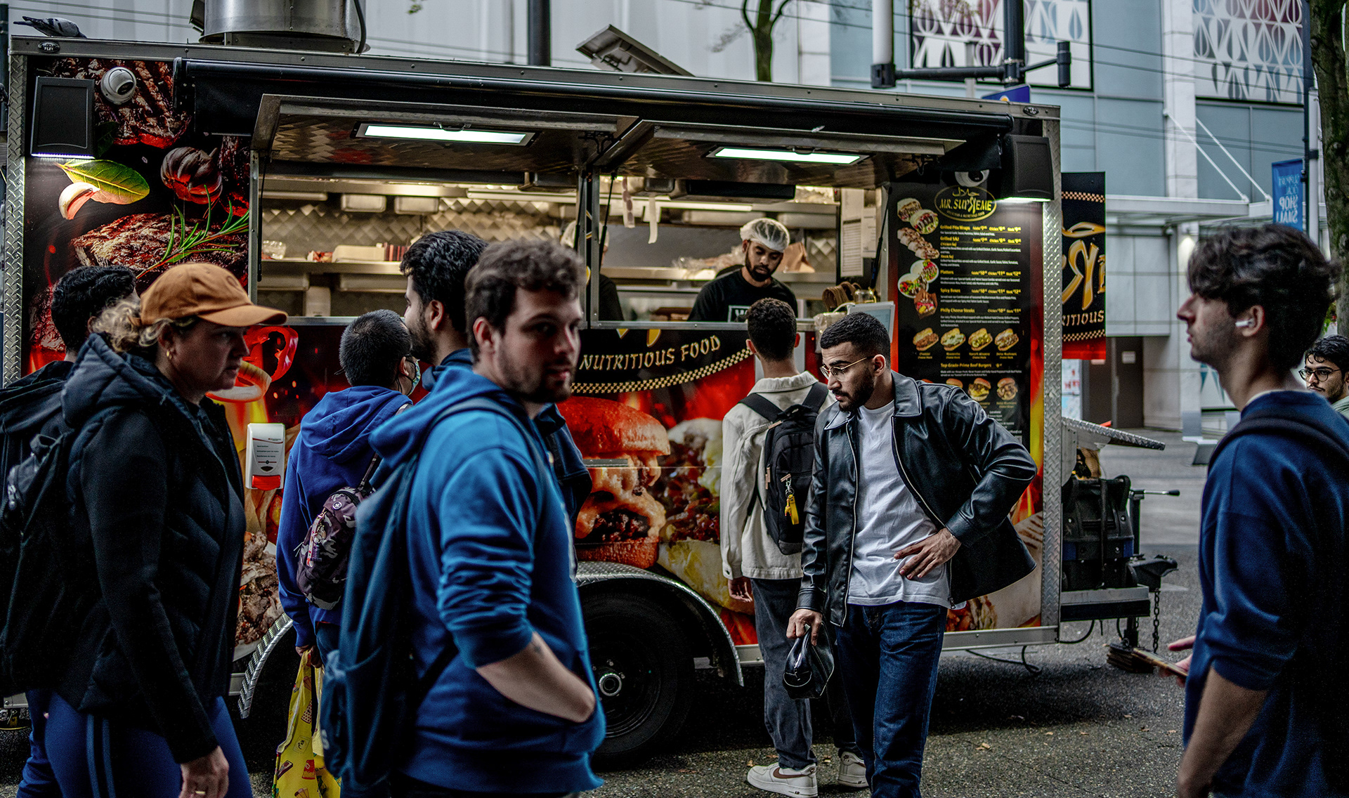 Vancouver Street photography Granville Mall food truck and passers by.
