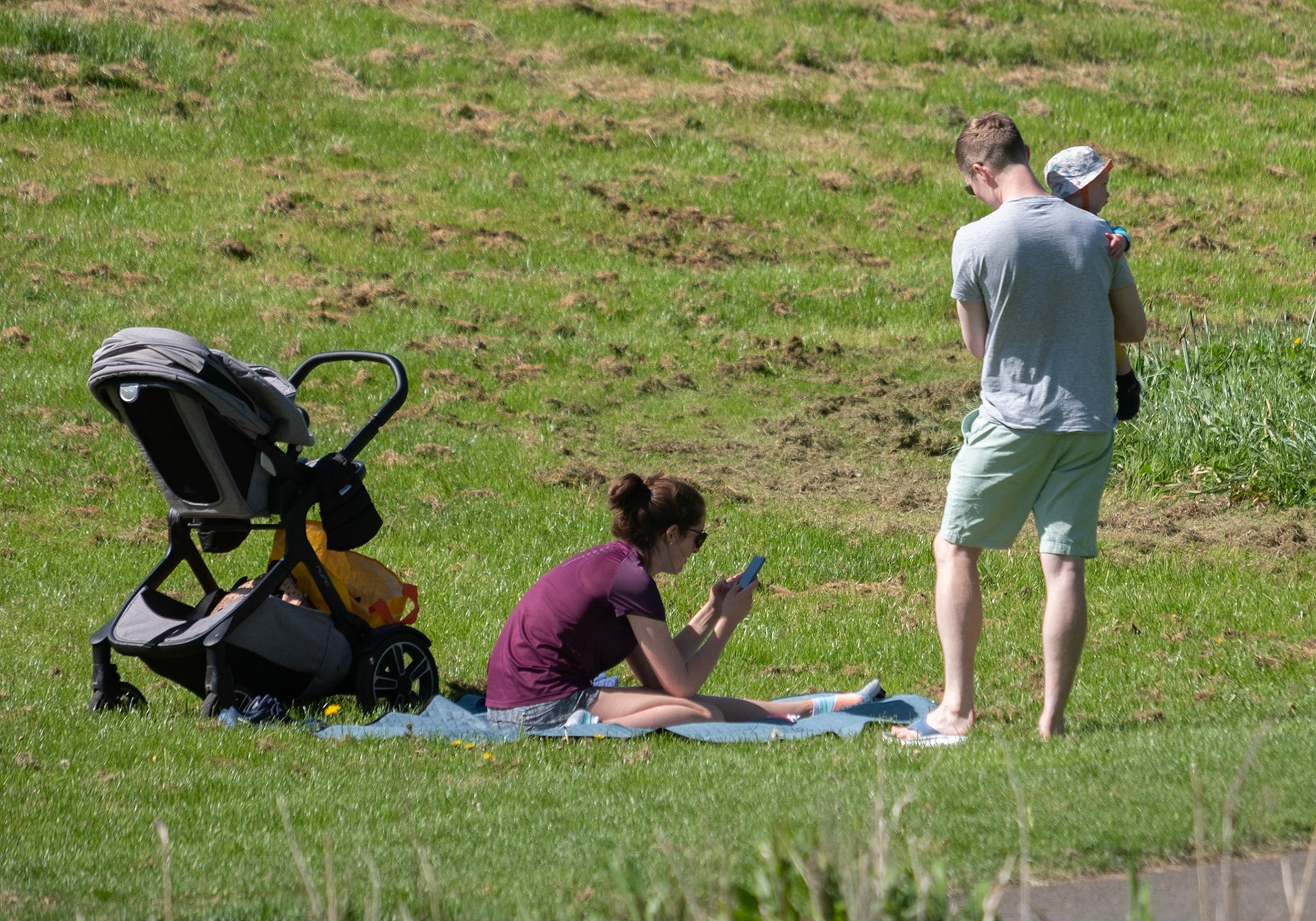 A familiy outing. As always these days, more attention seems to be paid to phones rather than people.