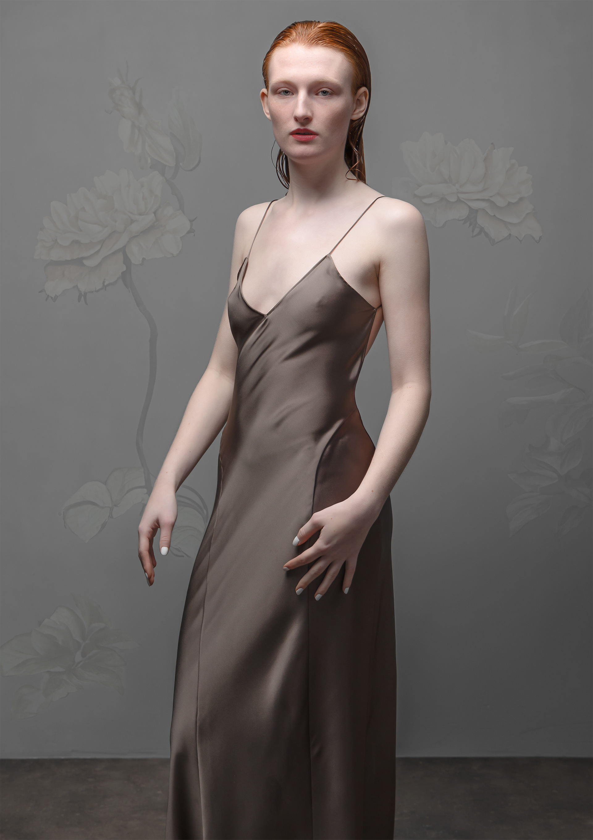 Fine art photography by Dai Scheffer, titled ‘Anouck’ A photographic portrait of a young woman in a dress, set against a lush floral background. Limited luxury editions printed on Hahnemühle Baryta Pearl, available exclusively through Lindenbaum Gallery. Exhibited internationally and available for sale at select art fairs.