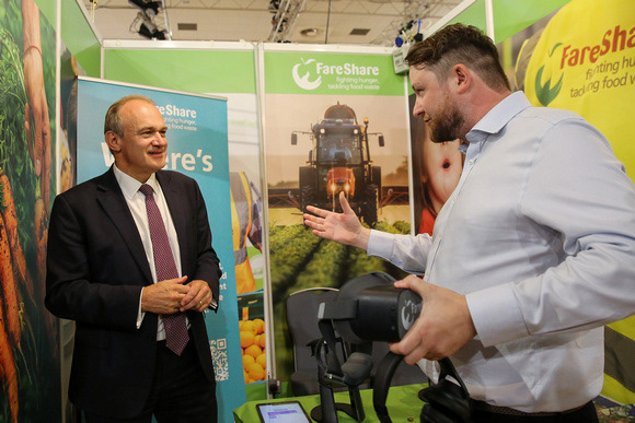 FareShare's Ali Gourley speaking to Lib Dem leader Ed Davey - Lib Dem Conference 2023