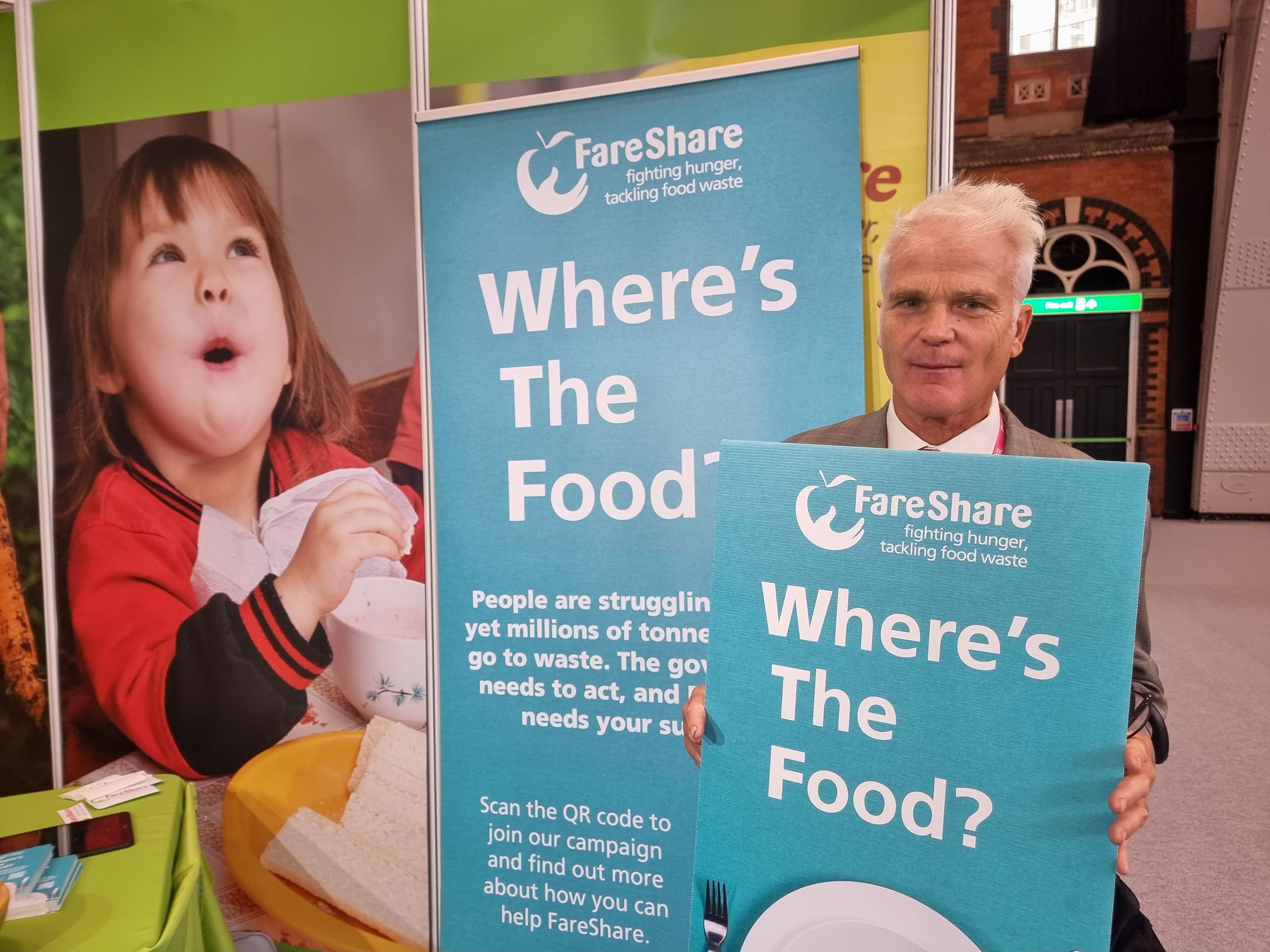 Conservative MP Desmond Swayne at FareShare's stand - Conservative Conference 2023 