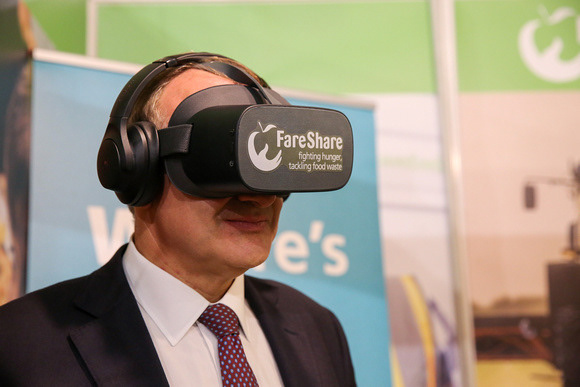 Lib Dem leader Ed Davey watching a FareShare VR film - Lib Dem Conference 2023