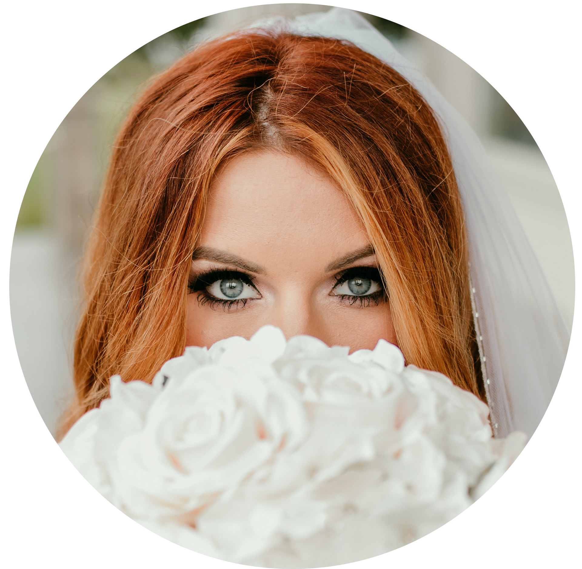 Beautiful bride hiding face behind bouquet