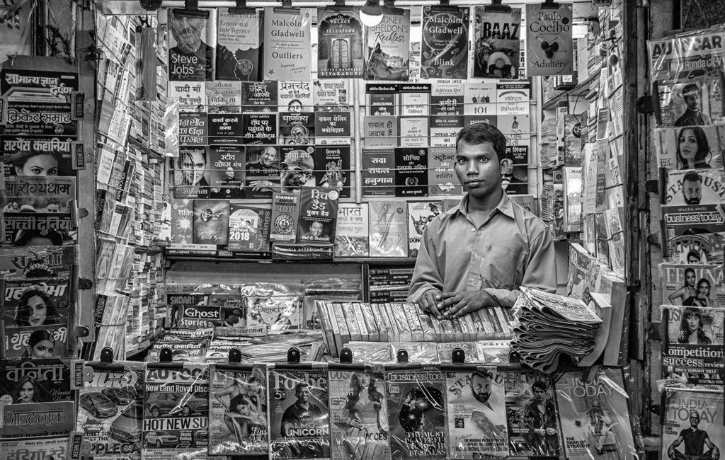"Newsagent, Delhi Train Station" - Black and White Spider Awards 2018 Nominee, Portrait