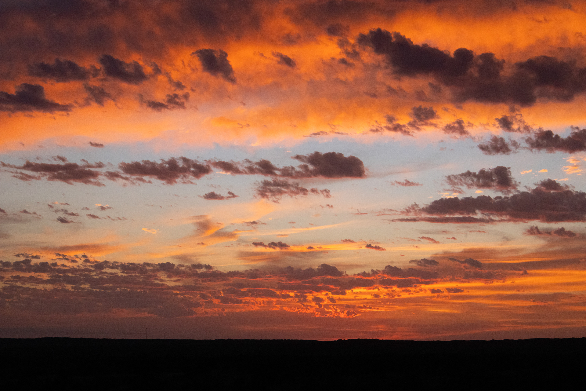 The sun sets over Mason Mountain Wildlife Management Area in Mason County, Texas.