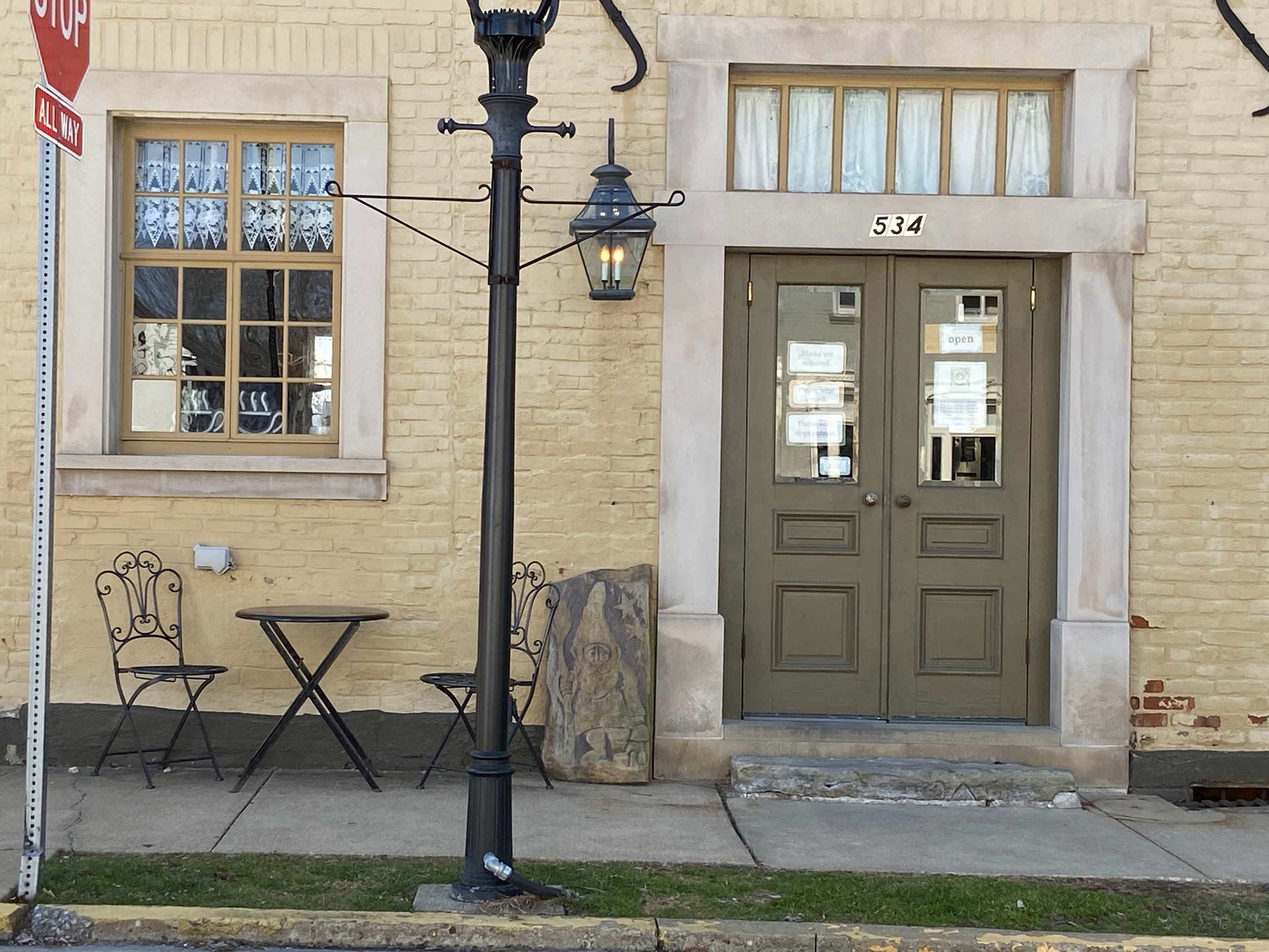 Pale yellow brick building in town center