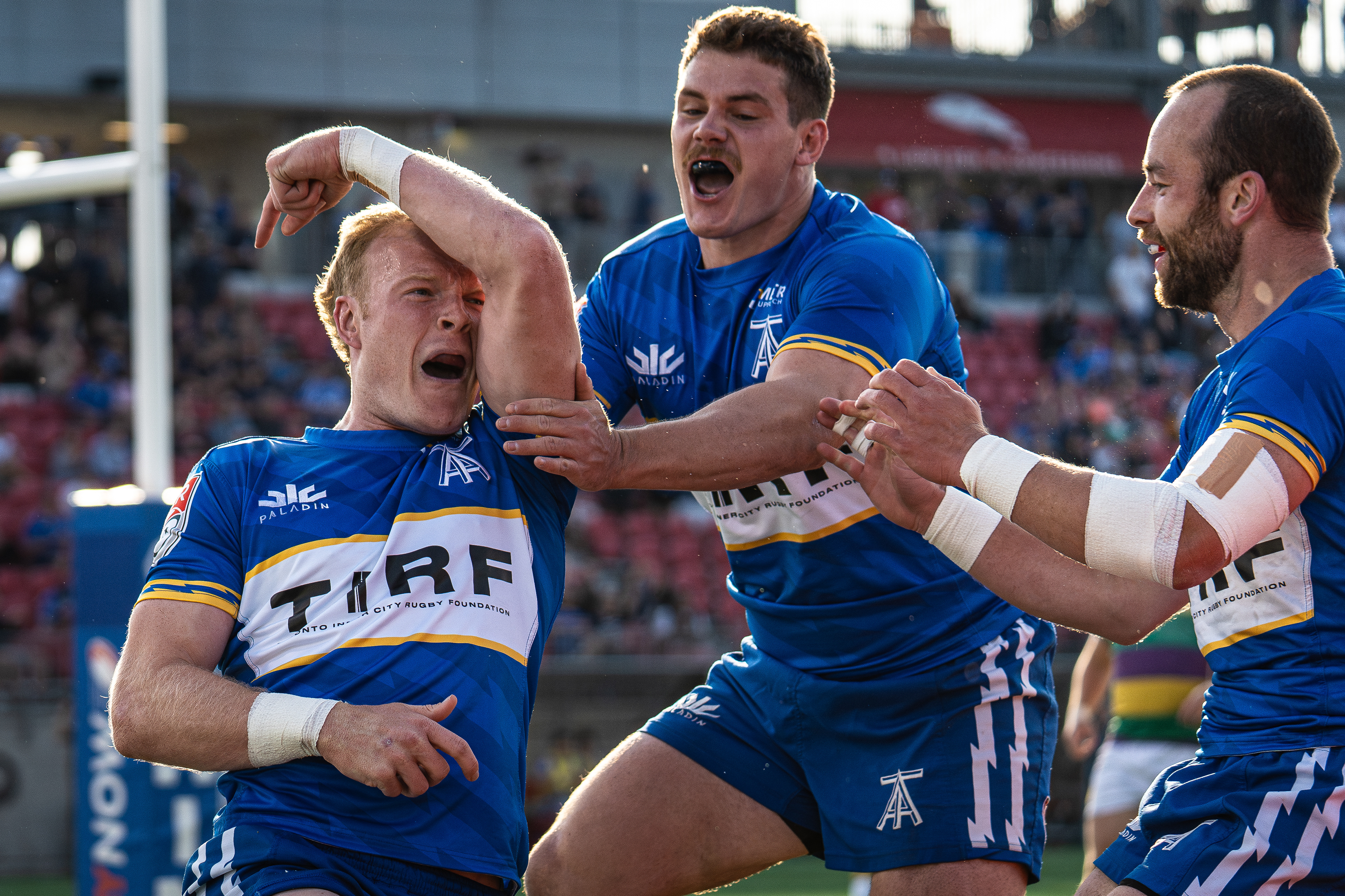 the Toronto Rugby Arrows celebrating a try