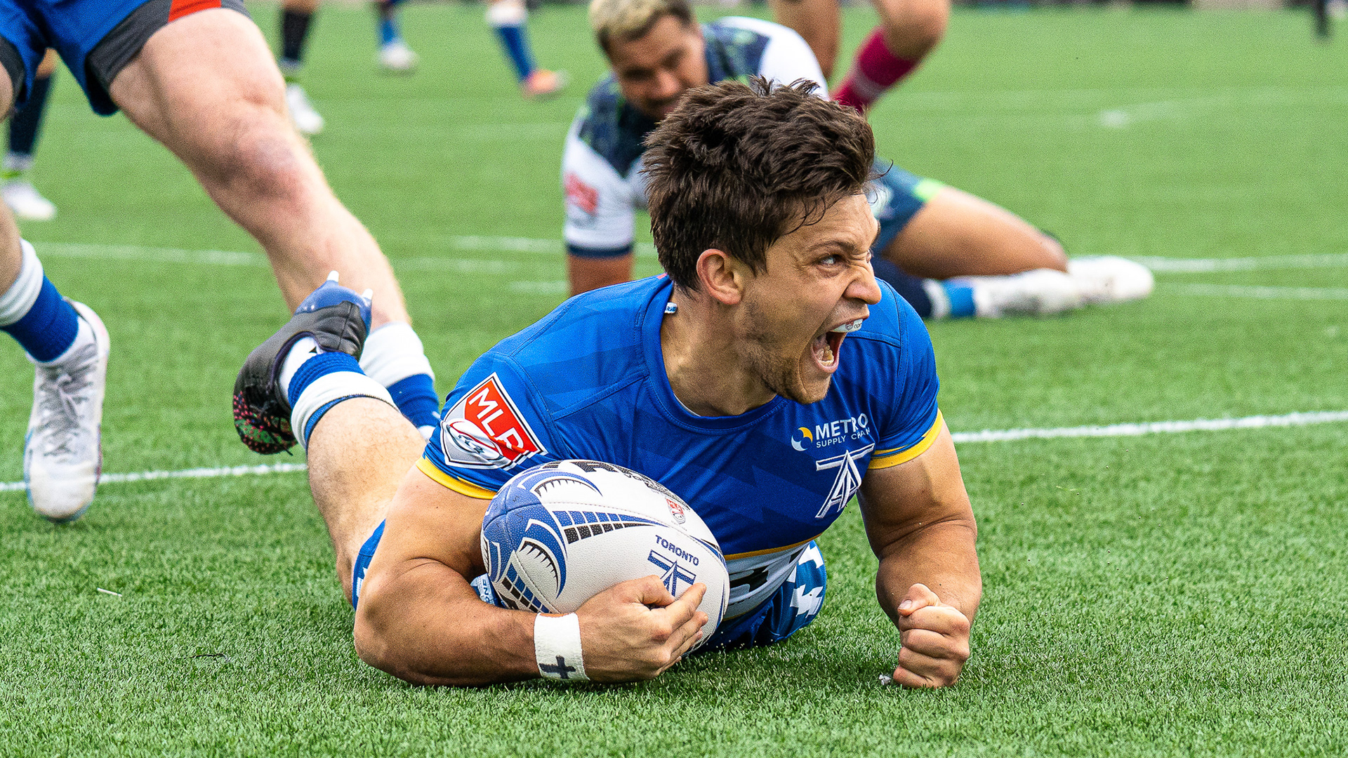 Featured sports action photograph showing athletes in motion