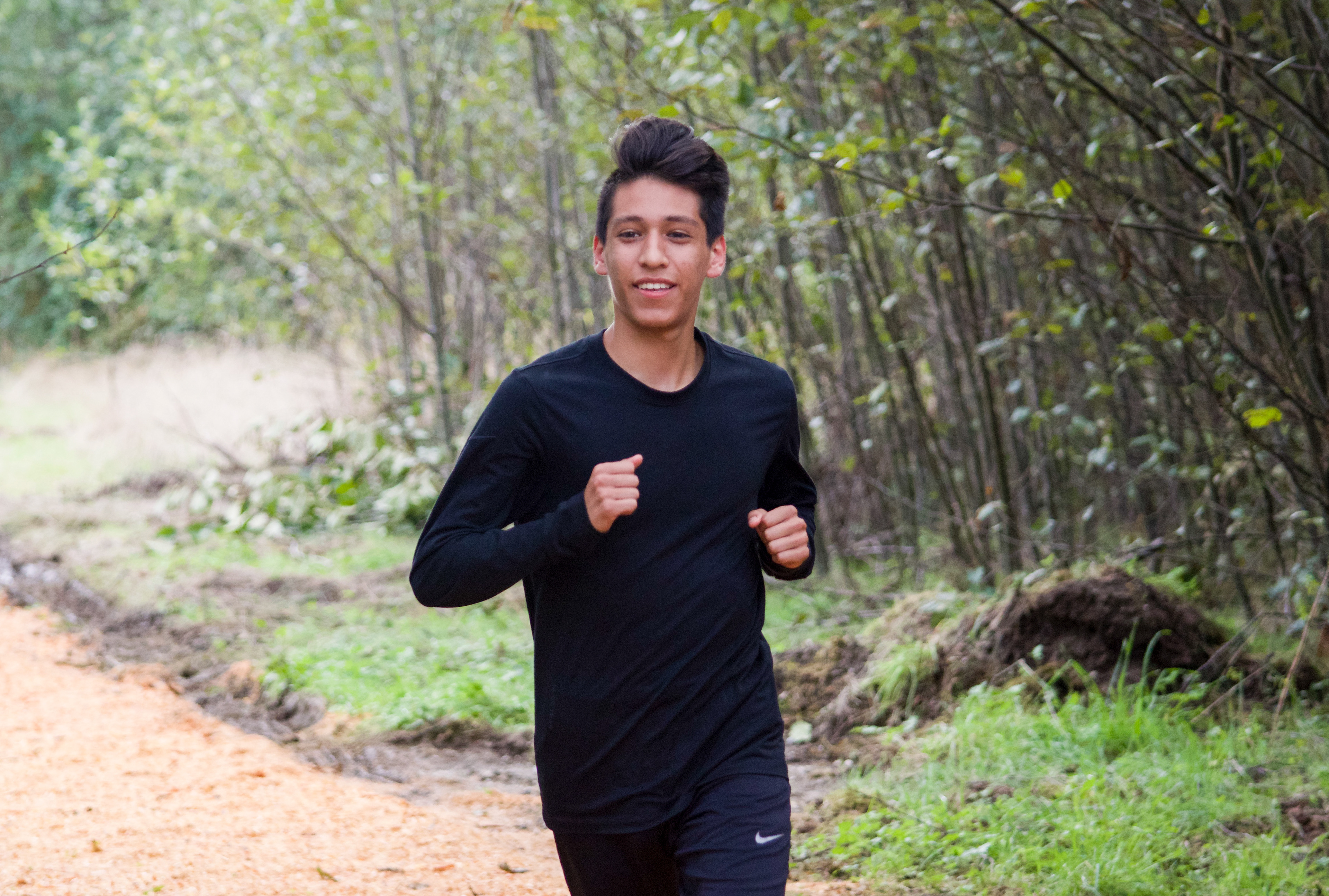 Granite Falls senior Isaac Cortes runs on Tuesday, Sept. 24 at Granite Falls' new running trial. Cortes is one of the top 1A cross-country runners in the state. (Katie Webber / The Herald)