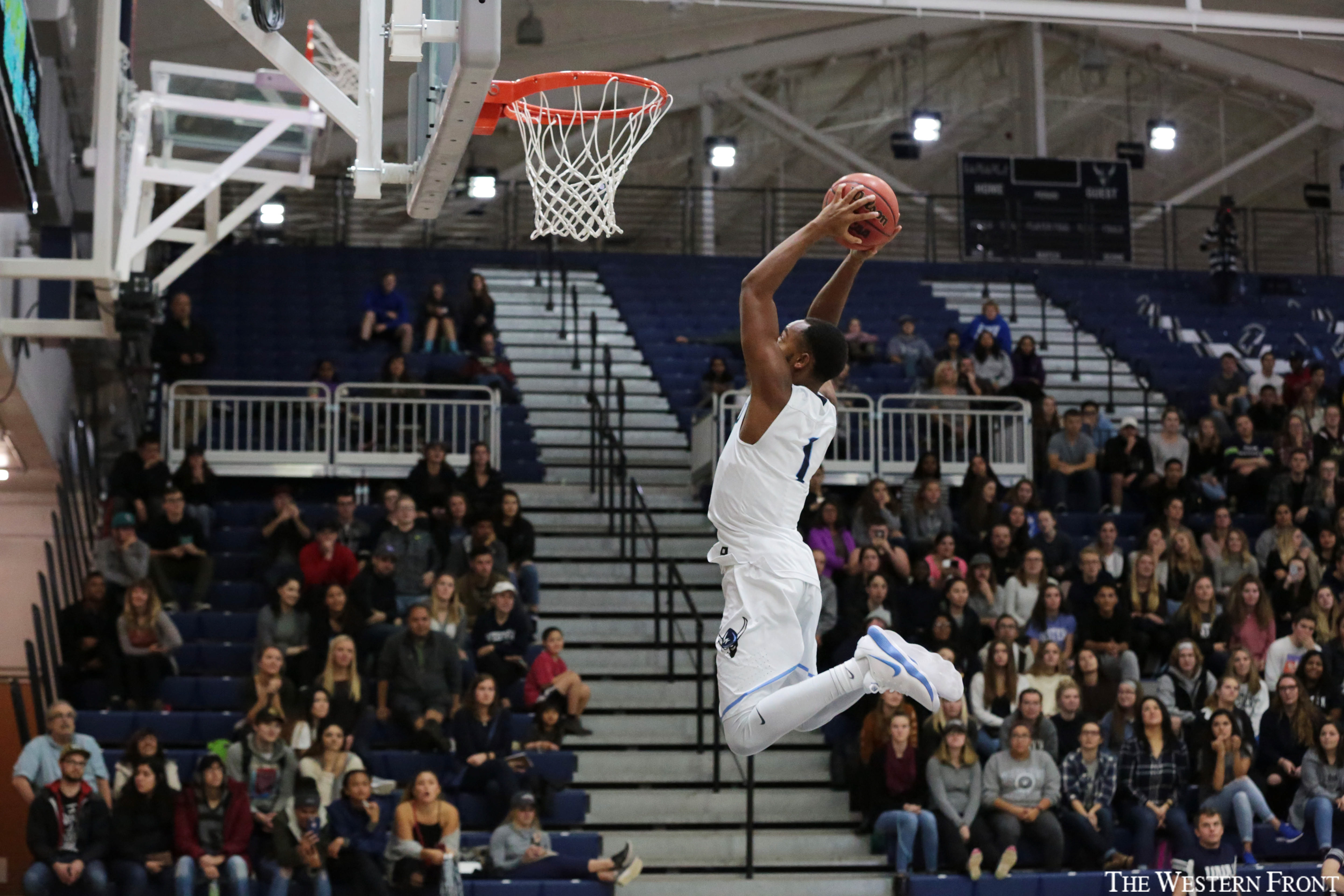 Junior Tyler Payne participates in the men's slam dunk contest at WWU's Viking Jam on Oct. 25, 2017.