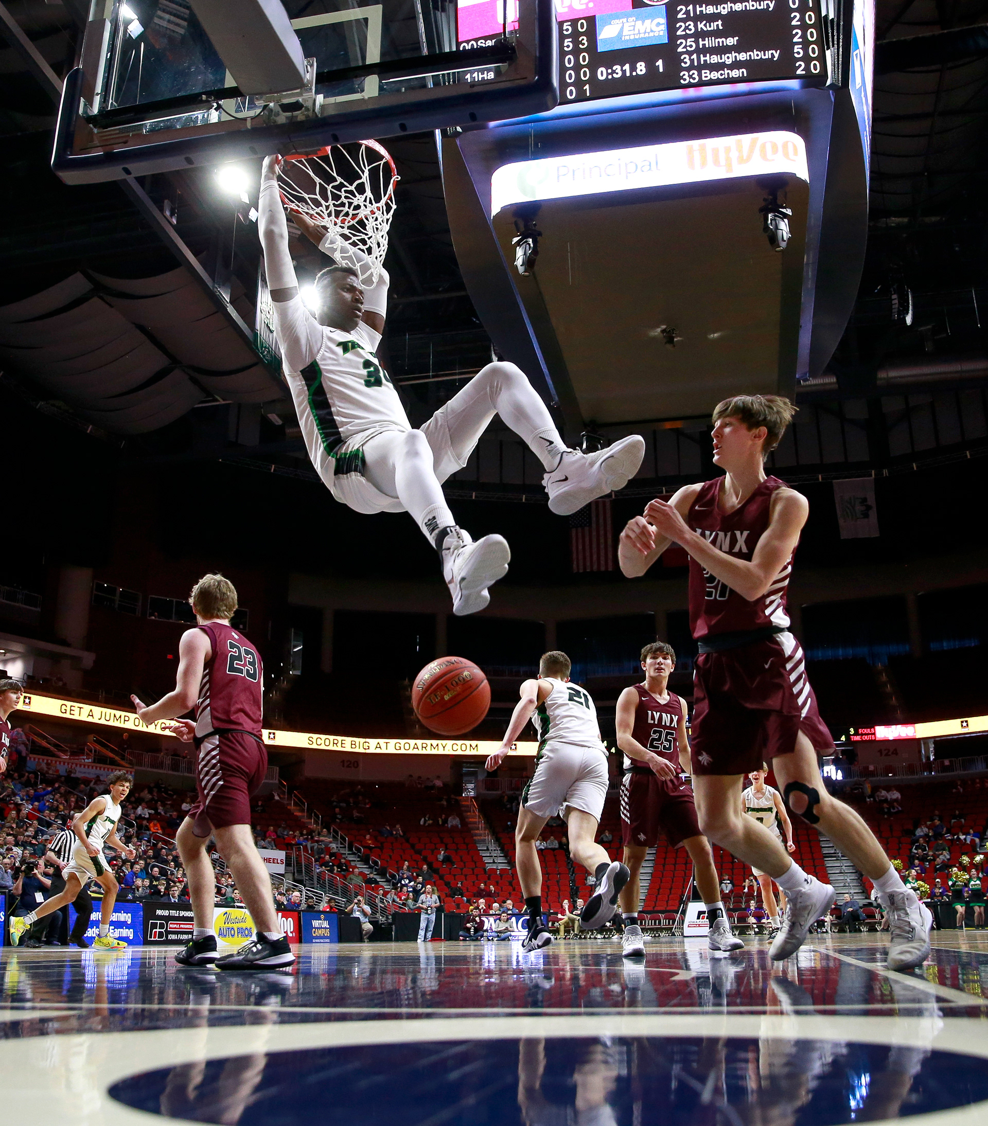 Grand View Christian's Daniel Tobiloba throws down a monster dunk in the first quarter against North Linn during the Iowa high school boys basketball tournament at Wells Fargo Arena in Des Moines on Friday, March 11, 2022.