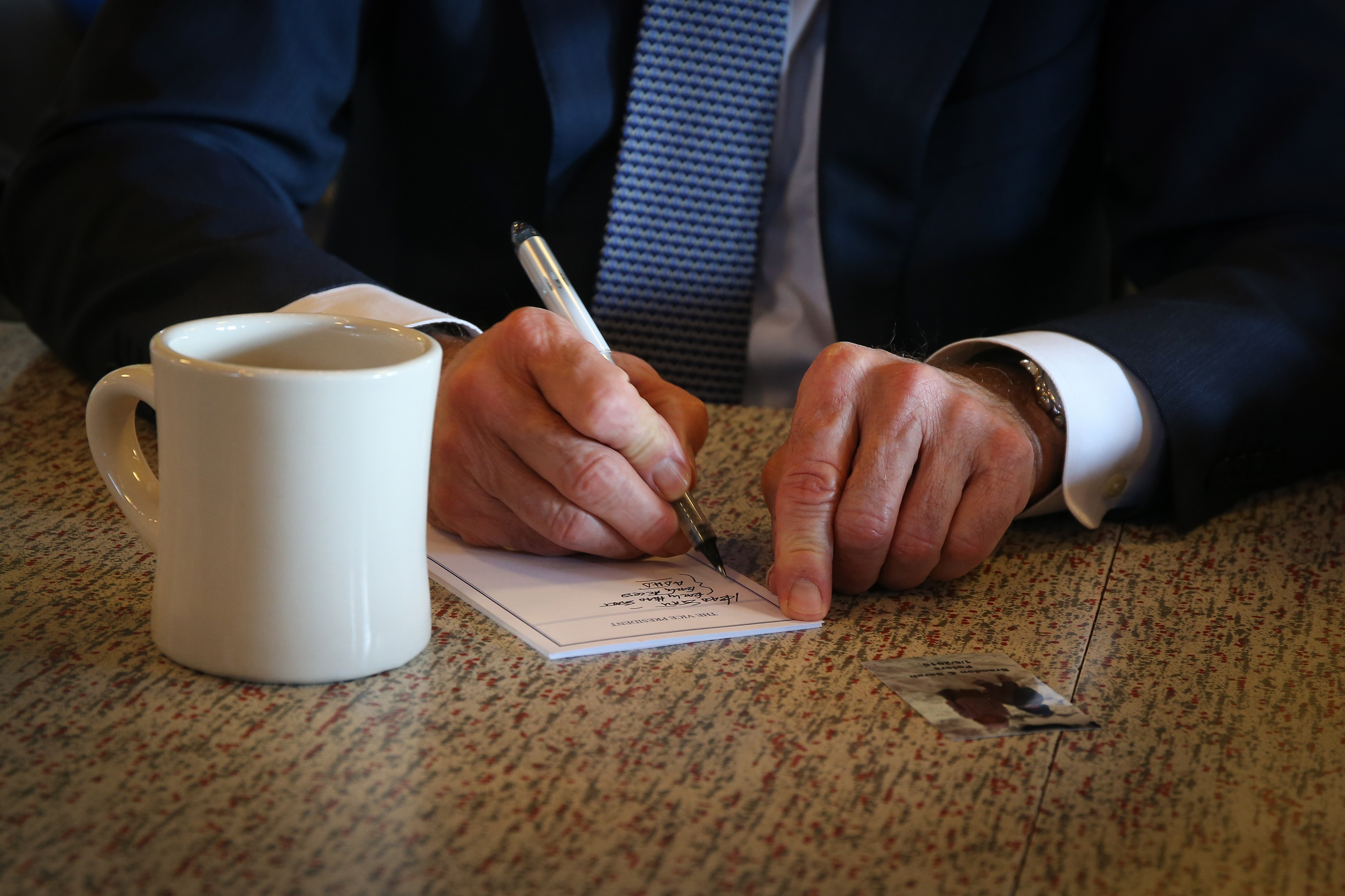 Vice President Joe Biden stopped for a cup of coffee and to chat with Iowans at Smokey Row Coffee Shop in Des Moines, Iowa, on Thursday, Feb. 12, 2015, following his speech at Drake University earlier.