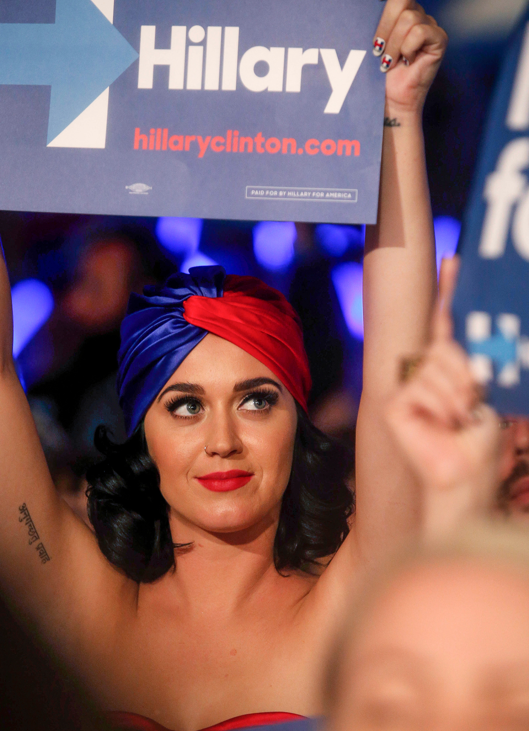 Pop music artist Katy Perry shows her support for Democratic presidential candidate Hillary Clinton on Saturday, Oct. 24, 2015, in Des Moines, Iowa.