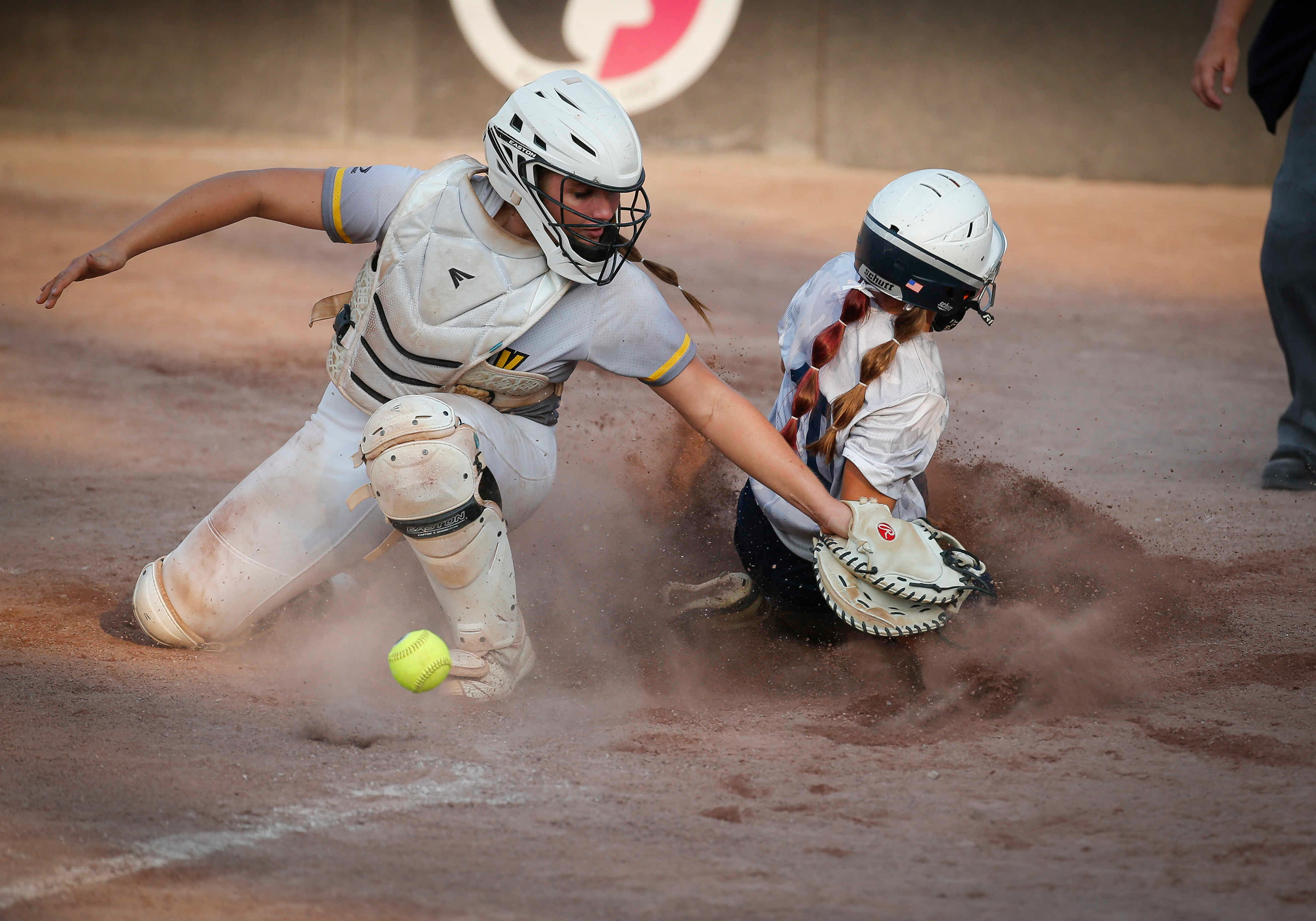 Pleasant Valley sophomore Reagan Hassel slides safely into home plate for the game-winning run against Southeast Polk on Tuesday, July 20, 2021, during the Iowa girls high school state softball tournament at the Harlan Rogers Softball Complex in Fort Dodge.