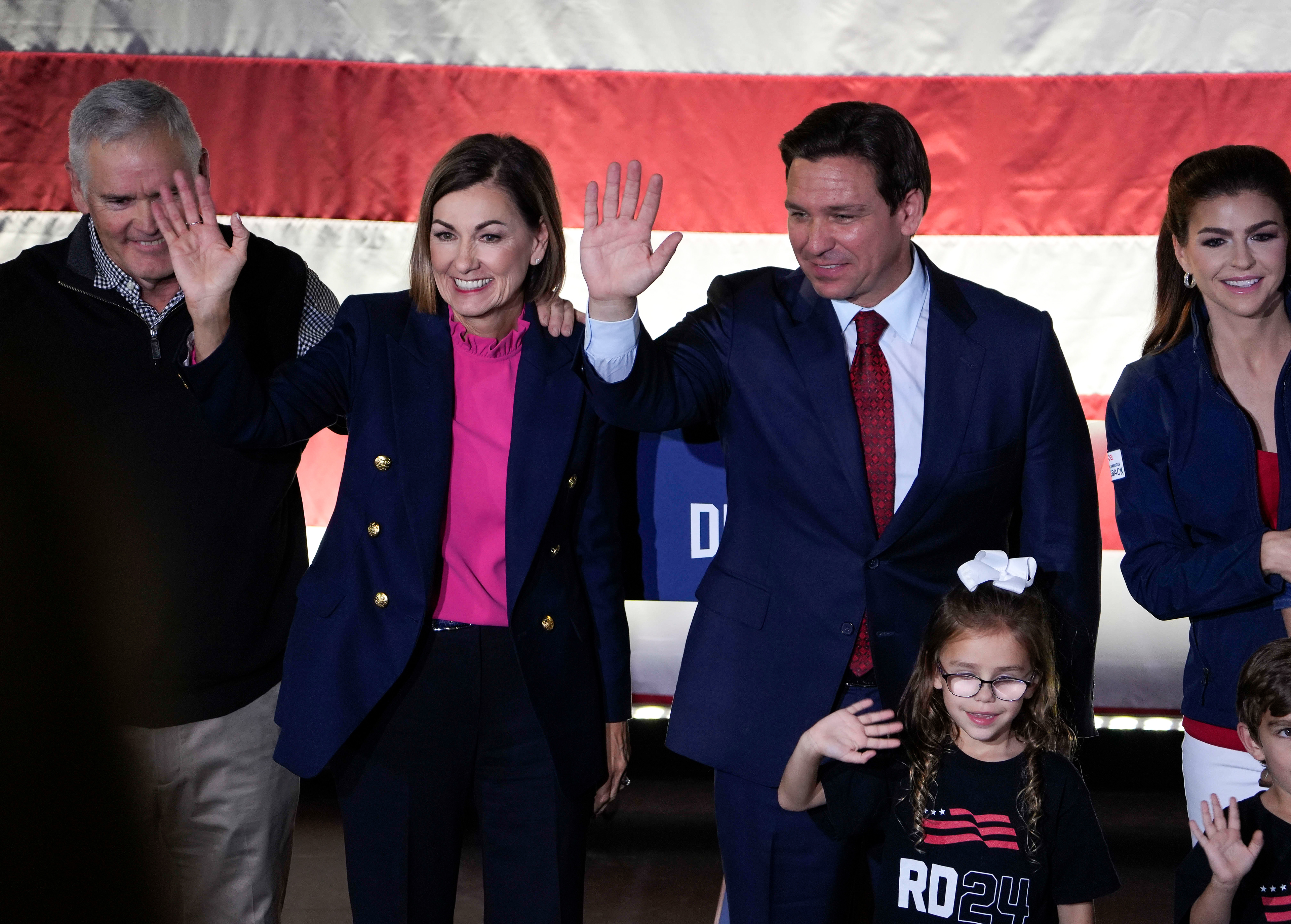 Iowa Gov. Kim Reynolds, second from left, joins Republican presidential candidate Florida Gov. Ron DeSantis on stage during a rally, Monday, Nov. 6, 2023, in Des Moines, Iowa. 