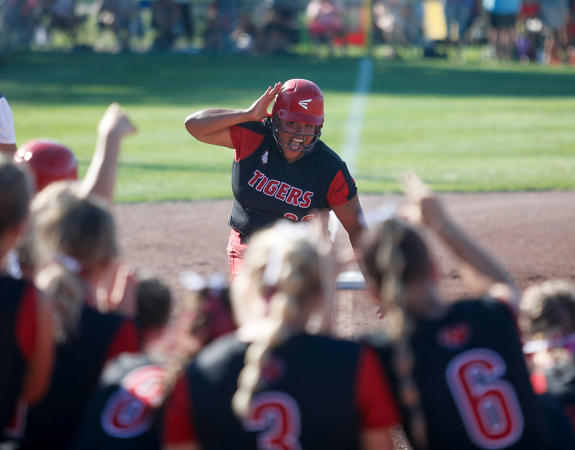 ADM junior Aliya Yanga celebrates as she makes her way to home plate after hitting a home run against North Scott in their Class 4A game on Monday, July 18, 2022, during the Iowa high school girls state softball tournament in Fort Dodge.