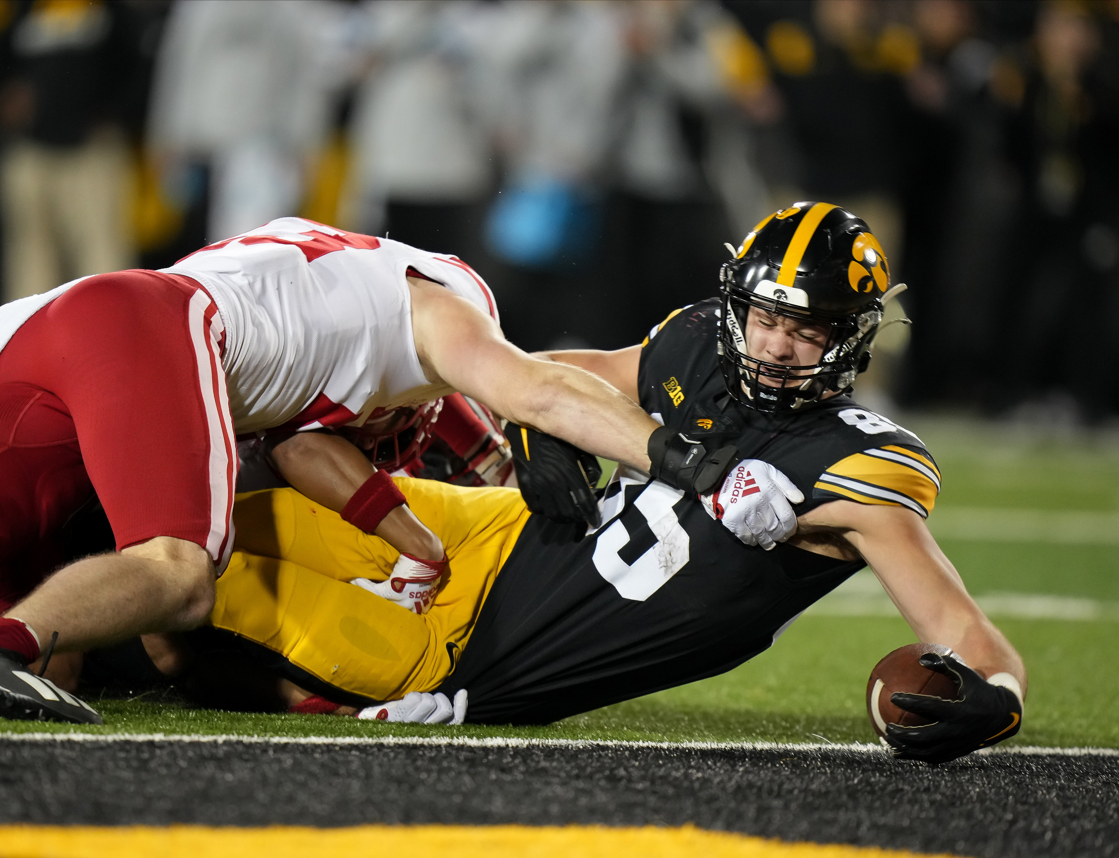 Iowa tight end Luke Lachey reaches the ball into the end zone for a touchdown in the fourth quarter against Nebraska during a NCAA football game on Friday, Nov. 25, 2022, at Kinnick Stadium in Iowa City.