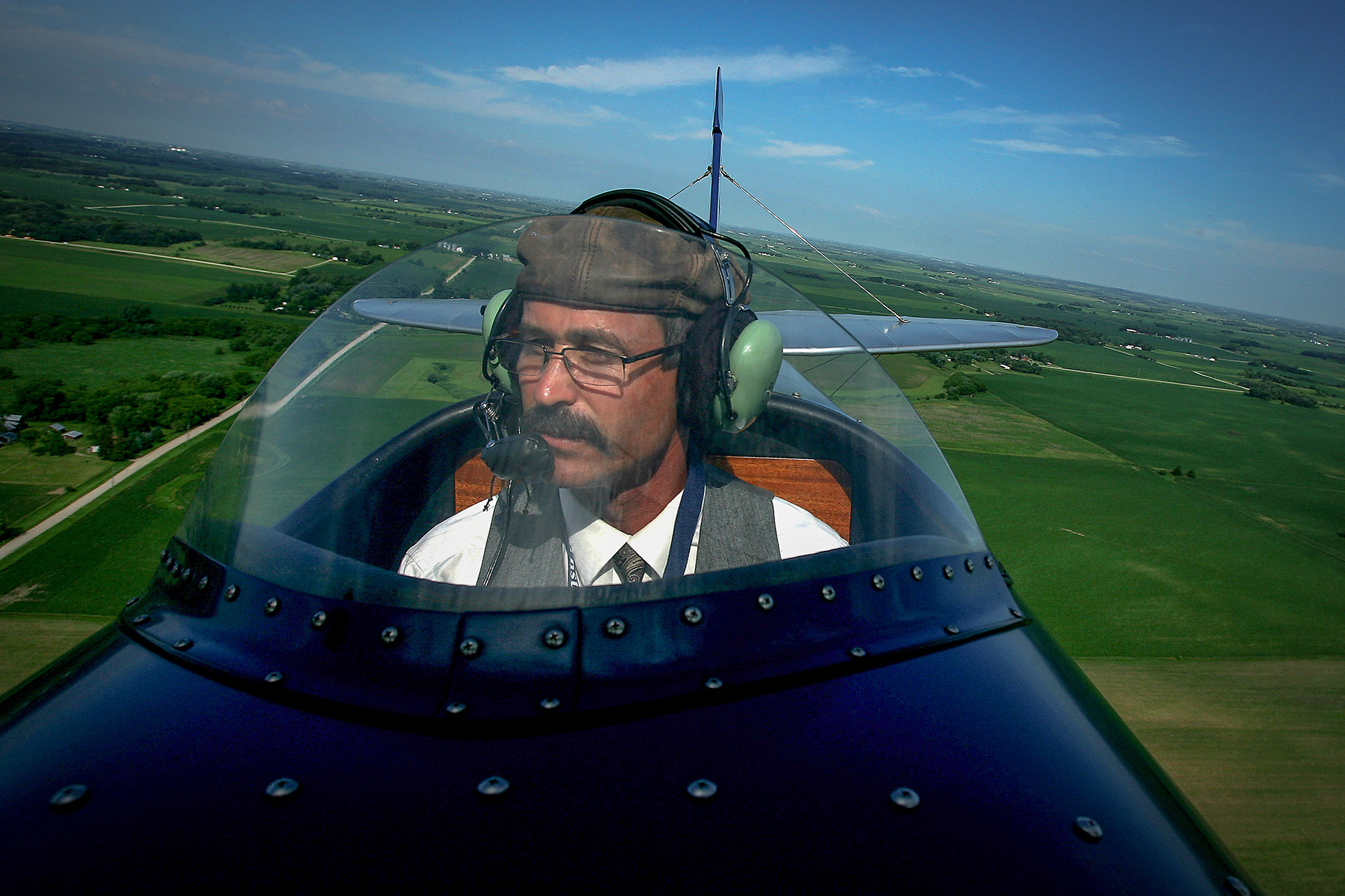 Pilot Clay Adams of the American Barnstormers Tour navigates around Clear Lake, Iowa on Thursday, June 16, 2010.