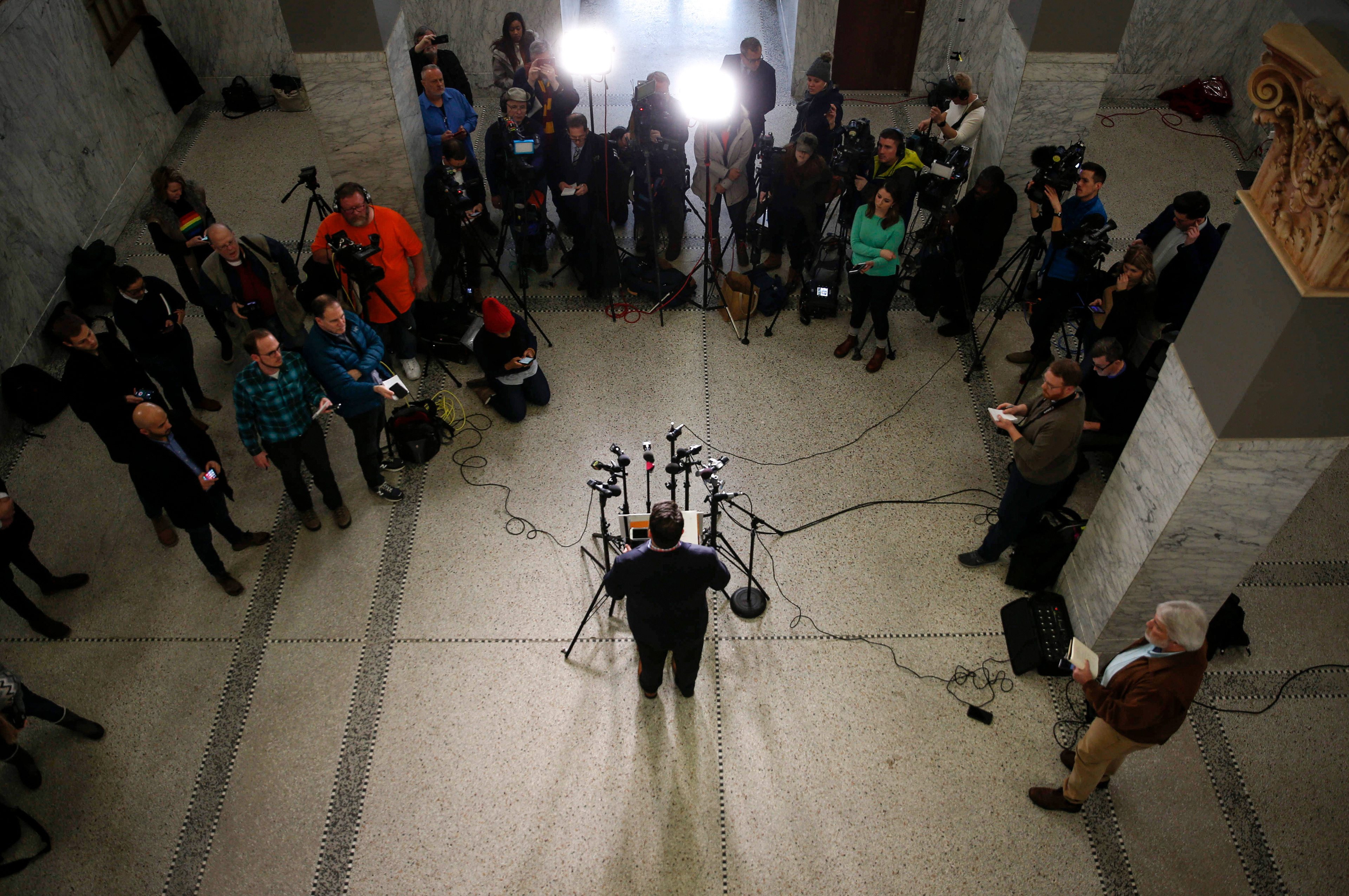Iowa Democratic Party chairman Troy Price speaks to members of the media during a press conference in Des Moines on Friday, Feb. 7, 2020.