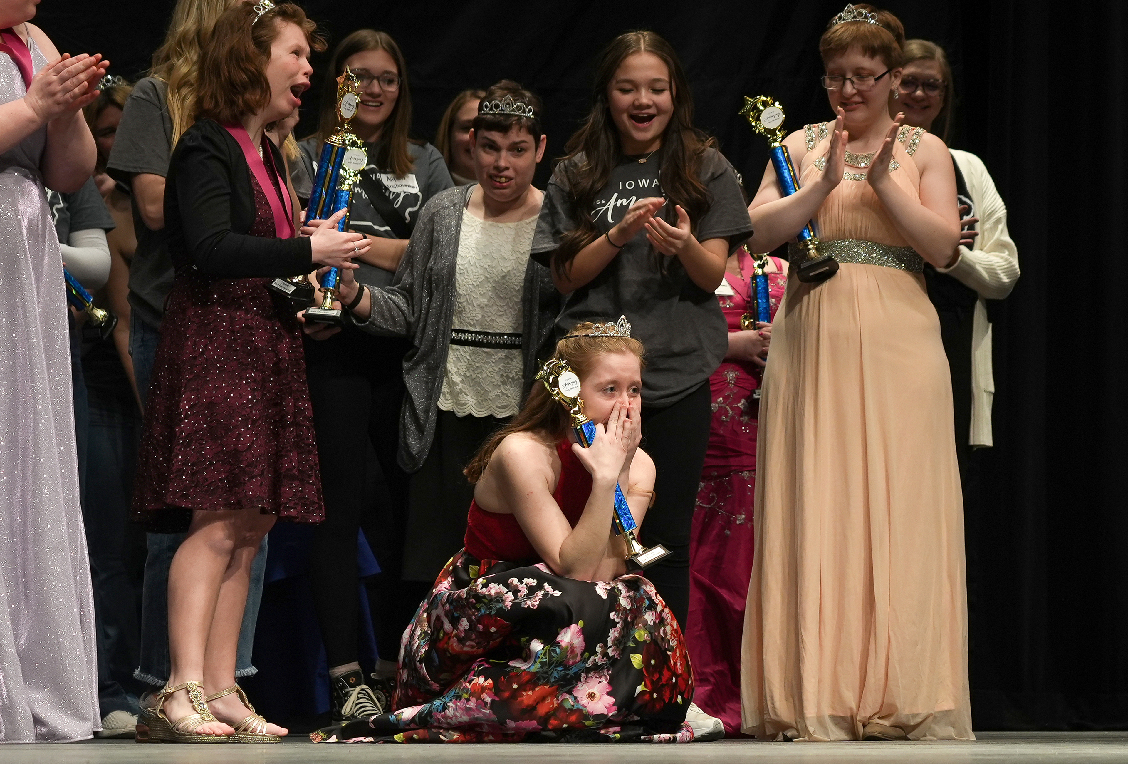 Andrea Bolen reacts after being named 2023 Junior Miss during the 11th Annual Iowa Miss Amazing pageant on Sunday, Feb. 5, 2023, in Urbandale, Iowa.