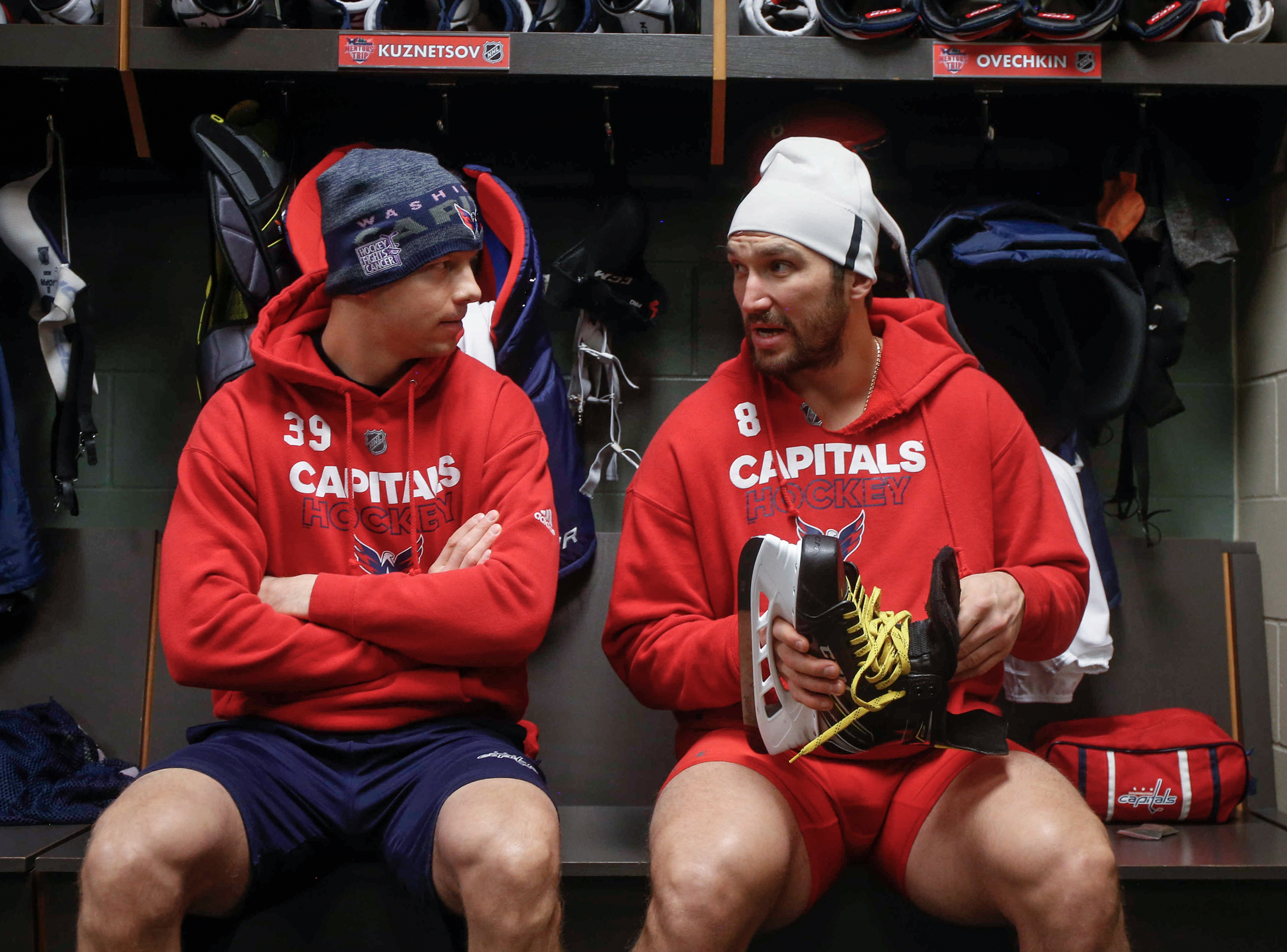 Washington Capitals left wing Alexander Ovechkin, right, talks with teammate Alex Chiasson prior to a team meeting in the locker room at the Xcel Energy Center on Thursday, Feb. 15, 2018, in St. Paul, Minn.