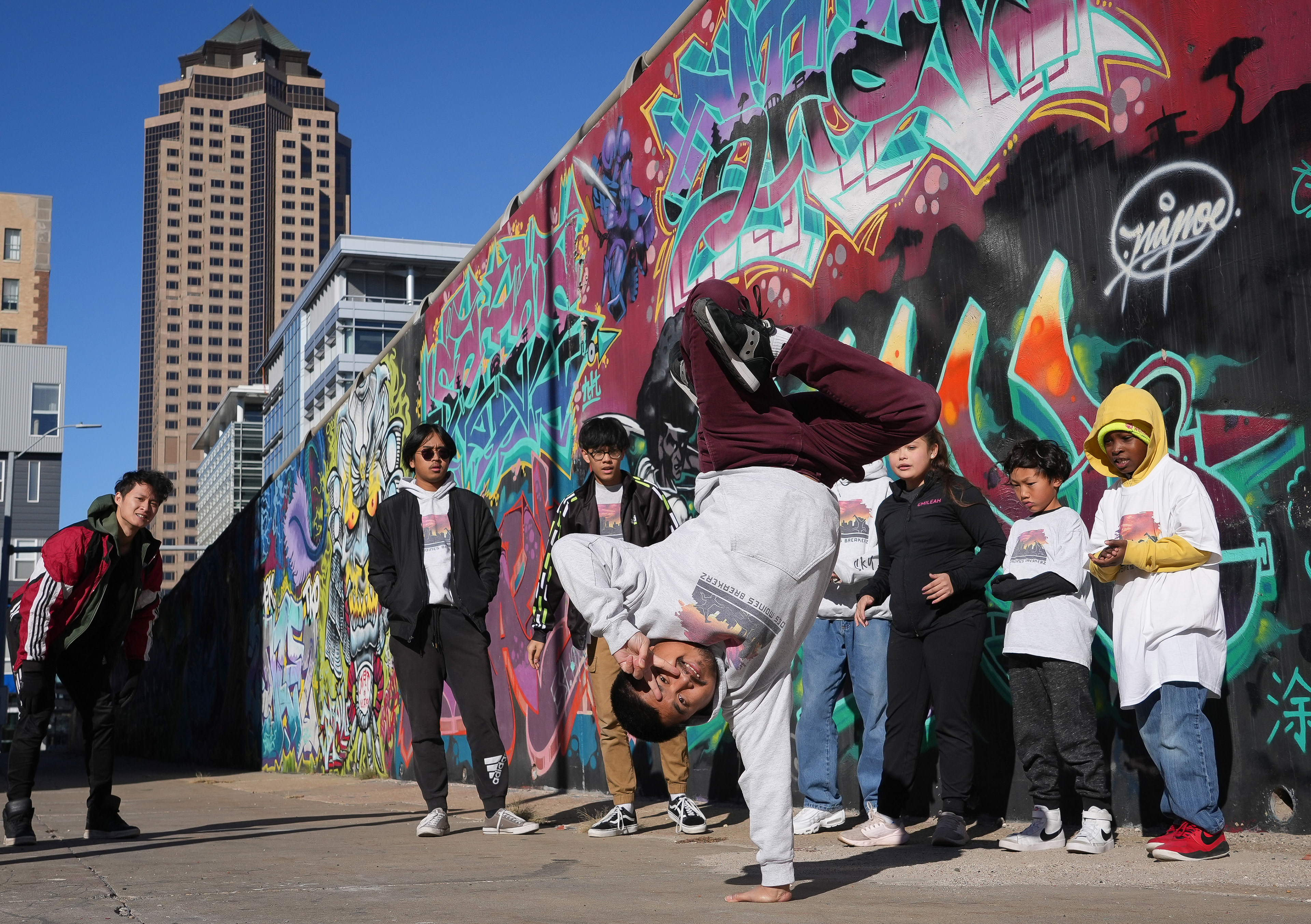 Breakdancer Anthony San of Des Moines dances with members of the Des Moines Breakerz on Sunday, Nov. 20, 2022, in downtown Des Moines.