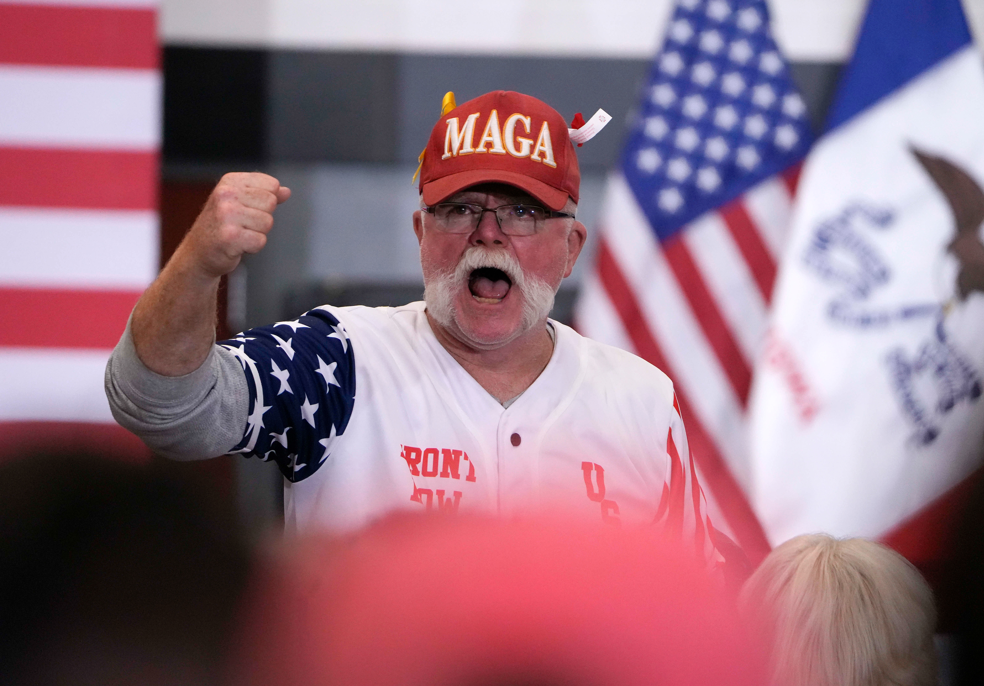 Supporters of Republican presidential candidate and former president Donald Trump gather to hear him speak during a rally Saturday, Nov. 18, 2023, in Fort Dodge, Iowa. (AP Photo/Bryon Houlgrave)