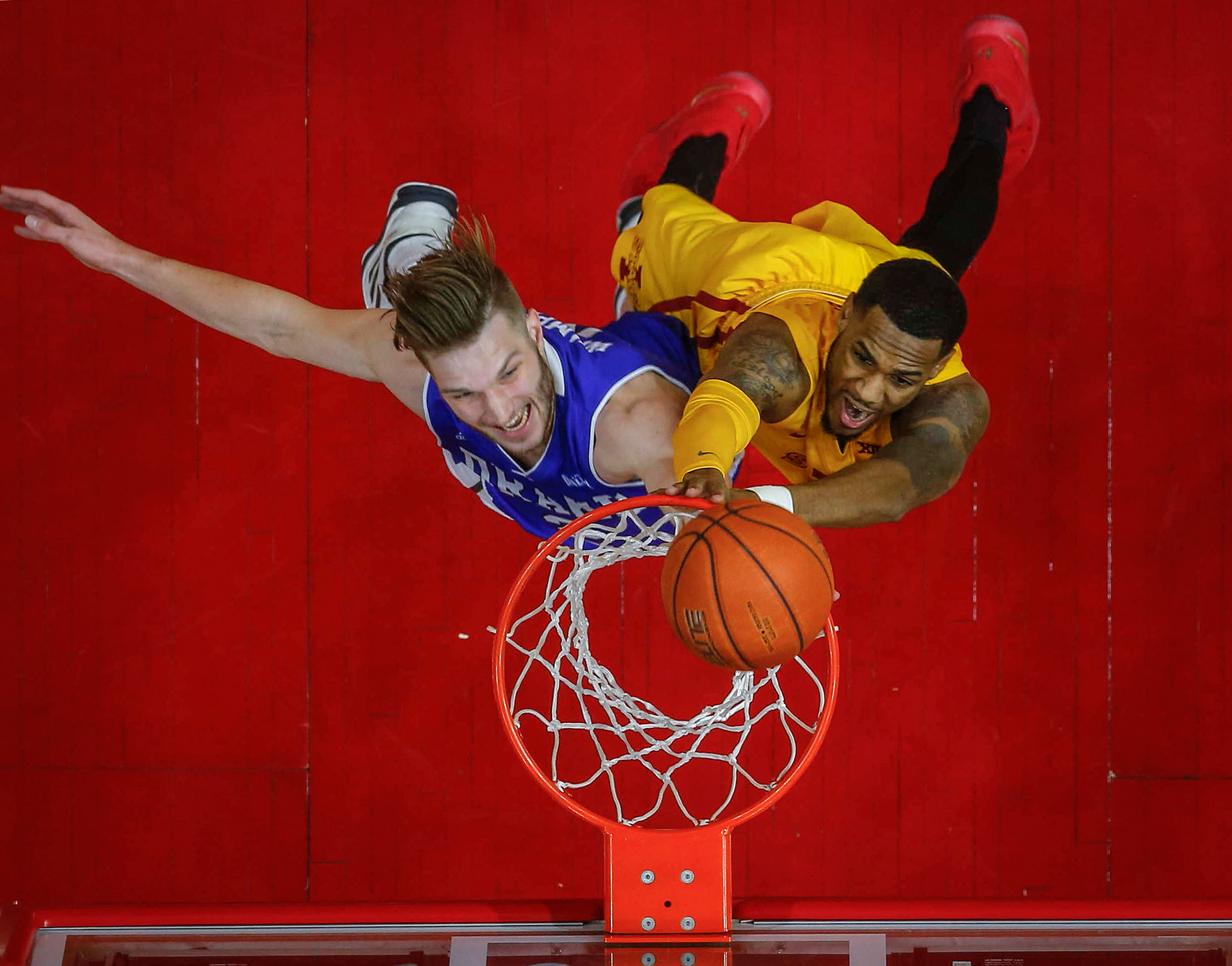 Iowa State senior Monte Morris scores over Drake sophomore Billy Wampler in the second half of the Hy-Vee Classic on Saturday, Dec. 17, 2016, at Wells Fargo Arena in Des Moines. 